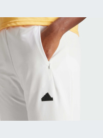 Повсякденні штани Adidas ZNE модель IS1874 Фото