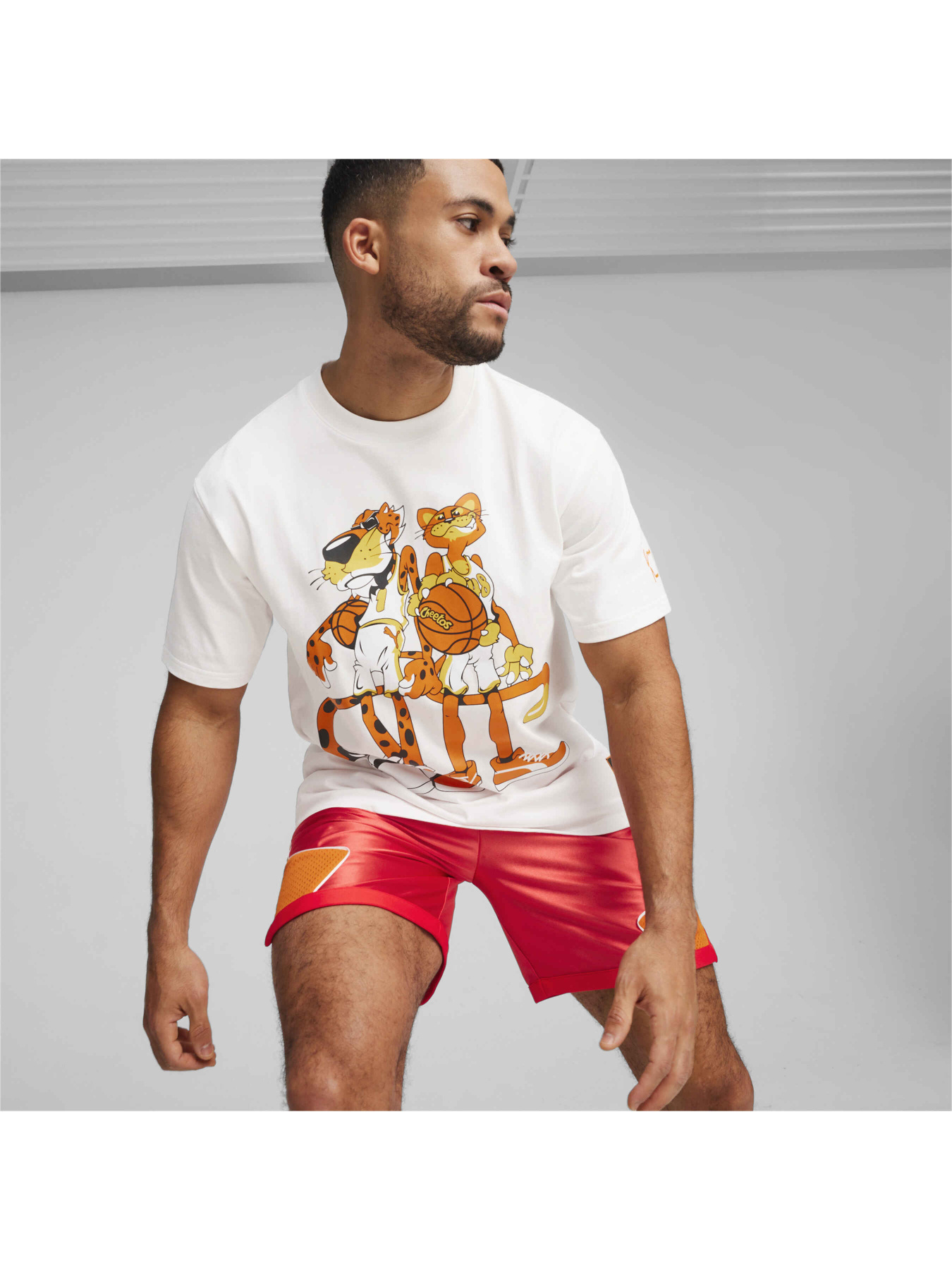 Футболка спортивна PUMA Hoops x Cheetos Tee I модель 625872 Фото