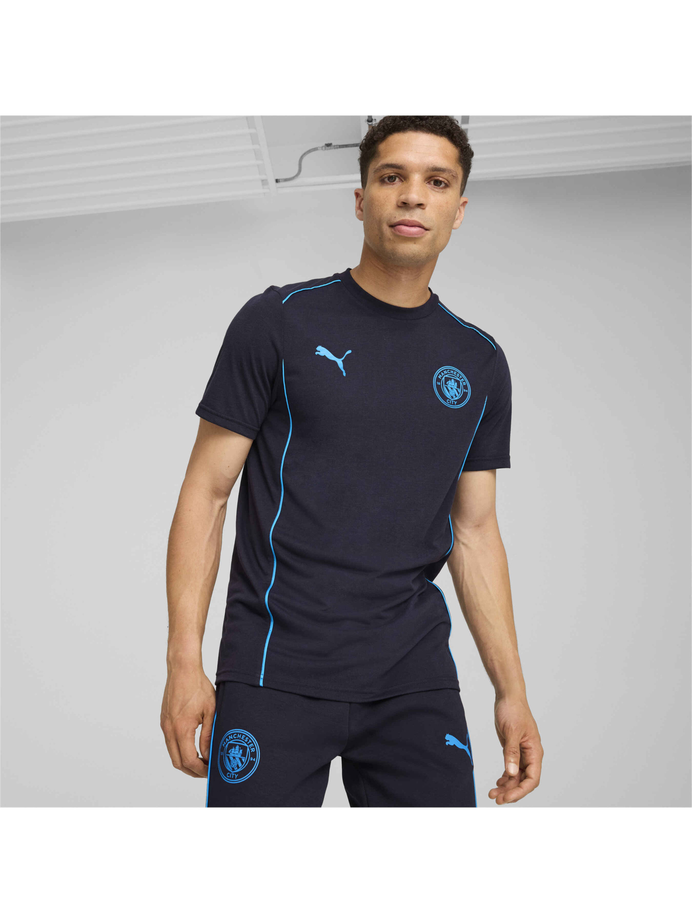 Спортивная футболка PUMA Mcfc Casuals Tee модель 777569 Фото