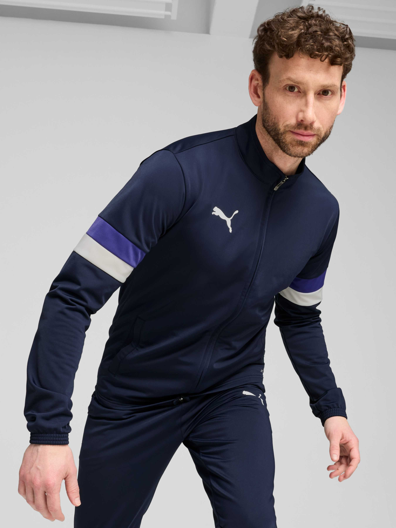 Спортивний костюм PUMA Individualrise Tracksuit модель 658996 Фото