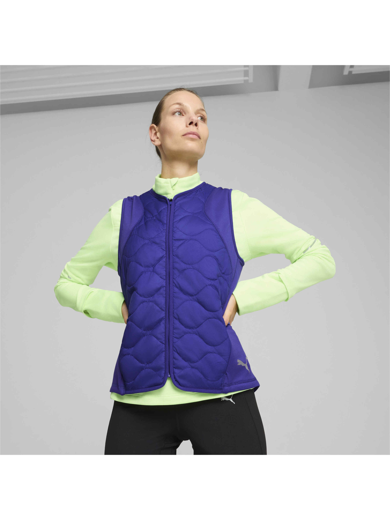 Утепленный жилет PUMA Run Wrmlbl Padded Vest W модель 524057 Фото