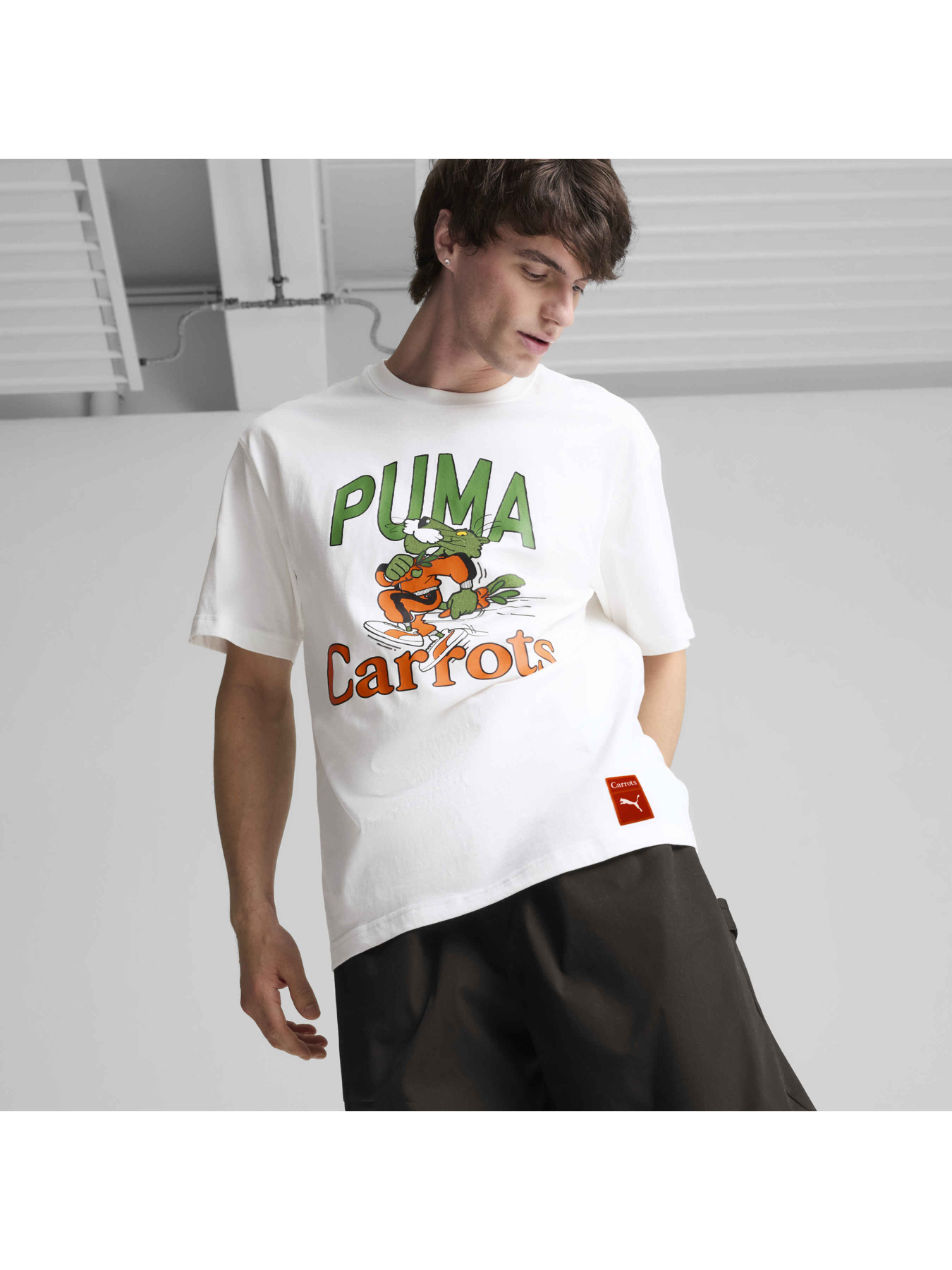 Футболка PUMA x Carrots Graphic Tee модель 627443 Футболка PUMA x Carrots Graphic Tee модель 627443 Фото