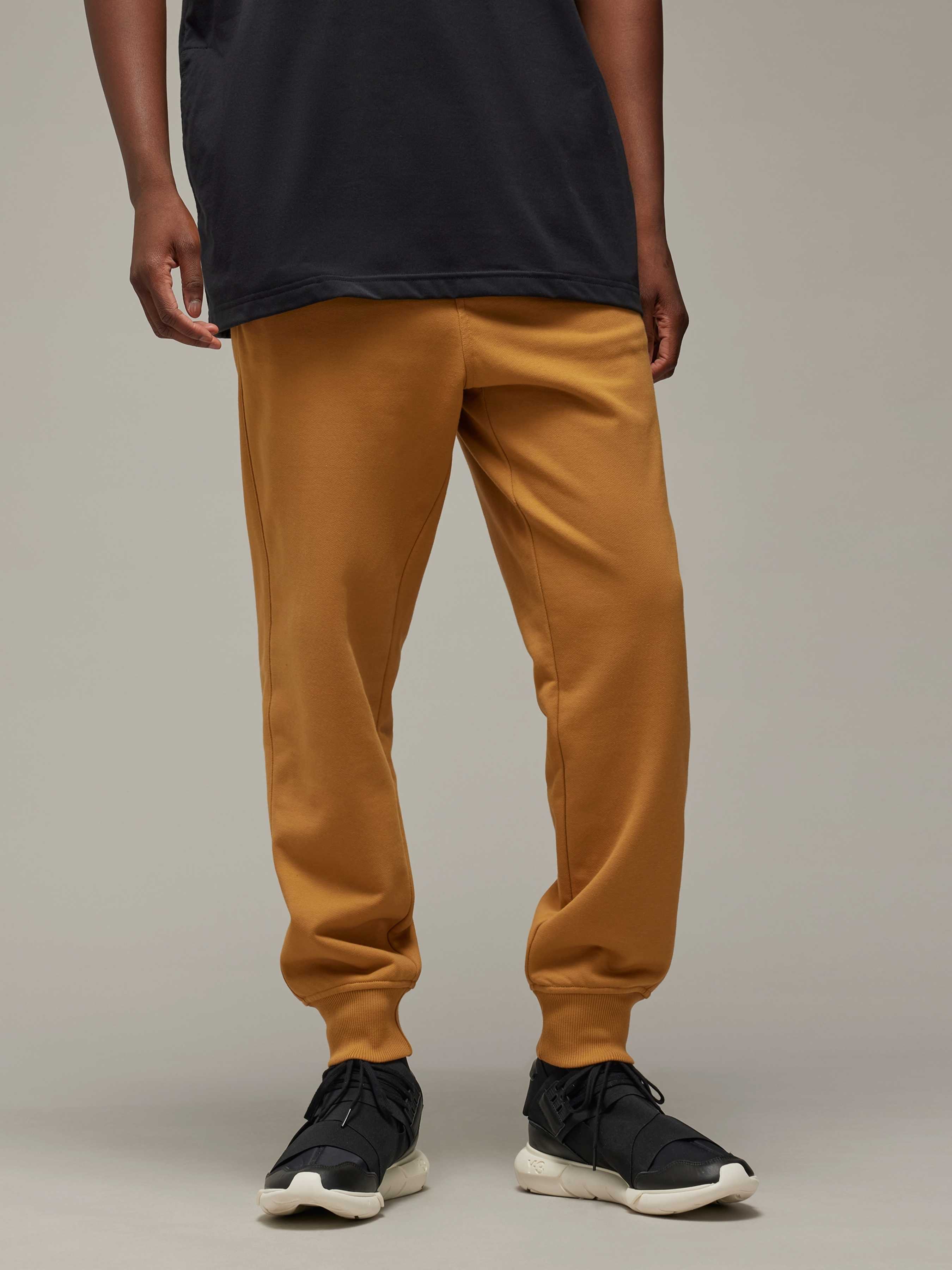 Бавовняні Чоловічі Джогери adidas  (IV5573) колір коричневий