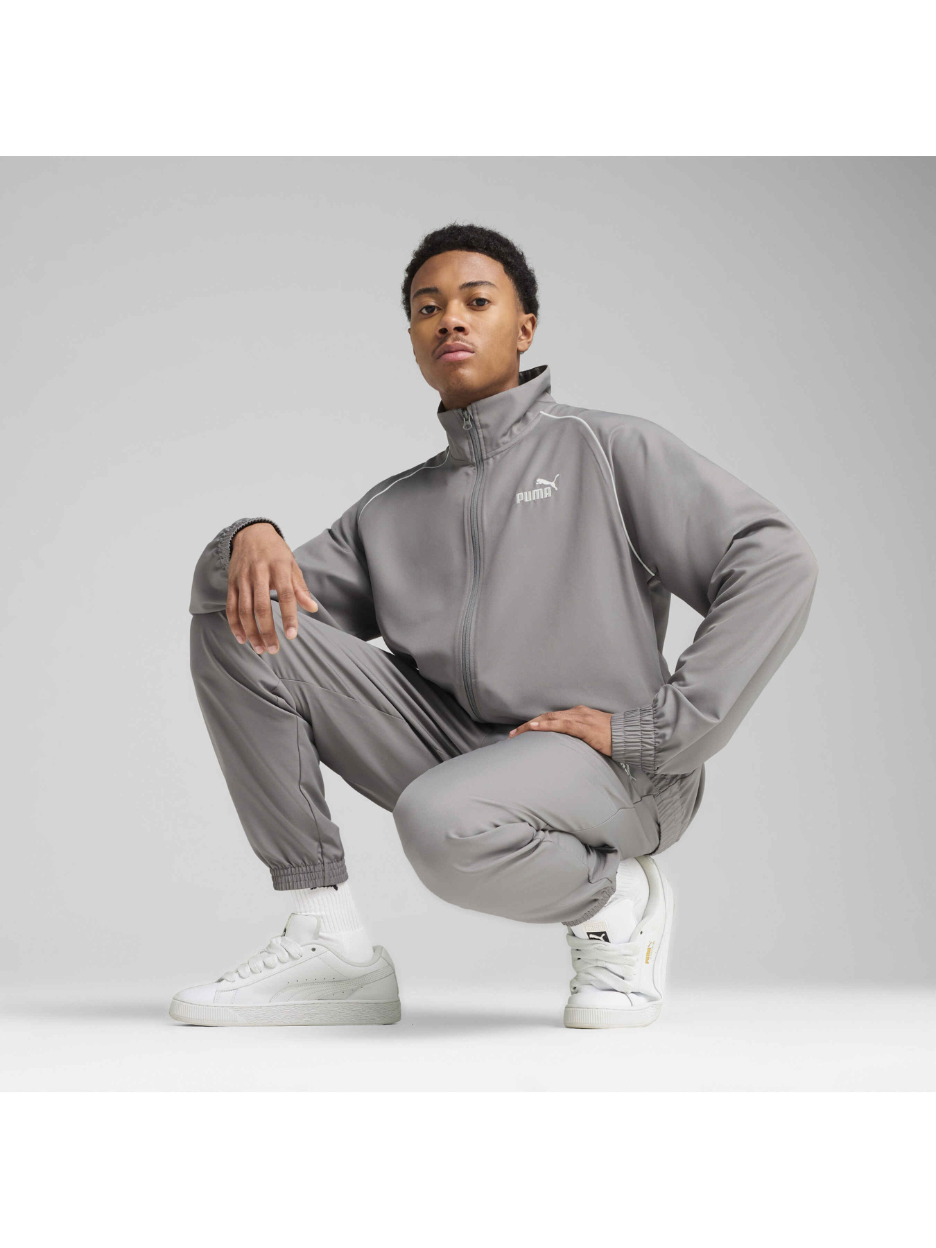Спортивний костюм PUMA Woven Piping Tracksuit модель 684849 Фото