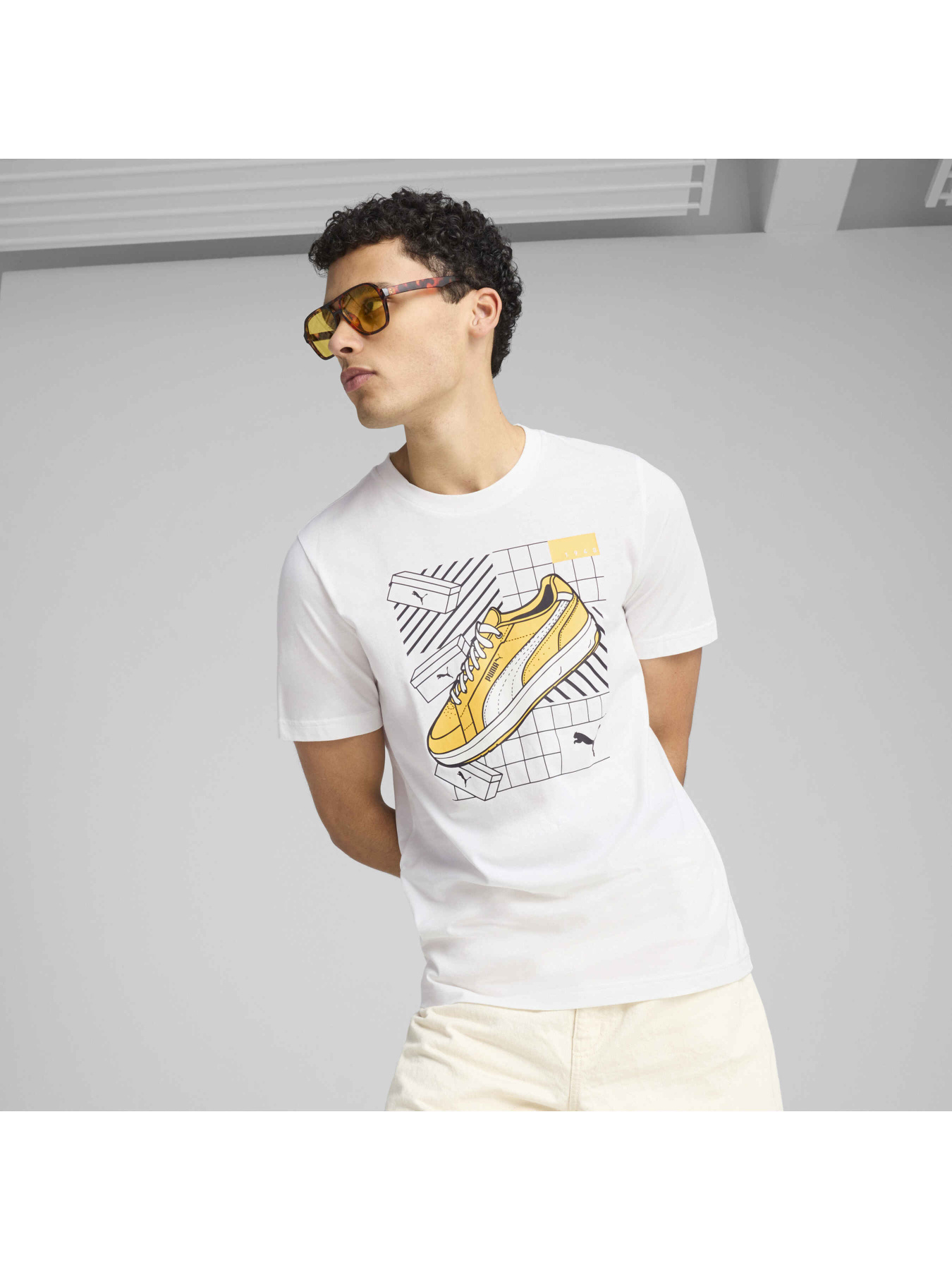 Футболка PUMA Graphics Sneaker Tee модель 684830 Фото