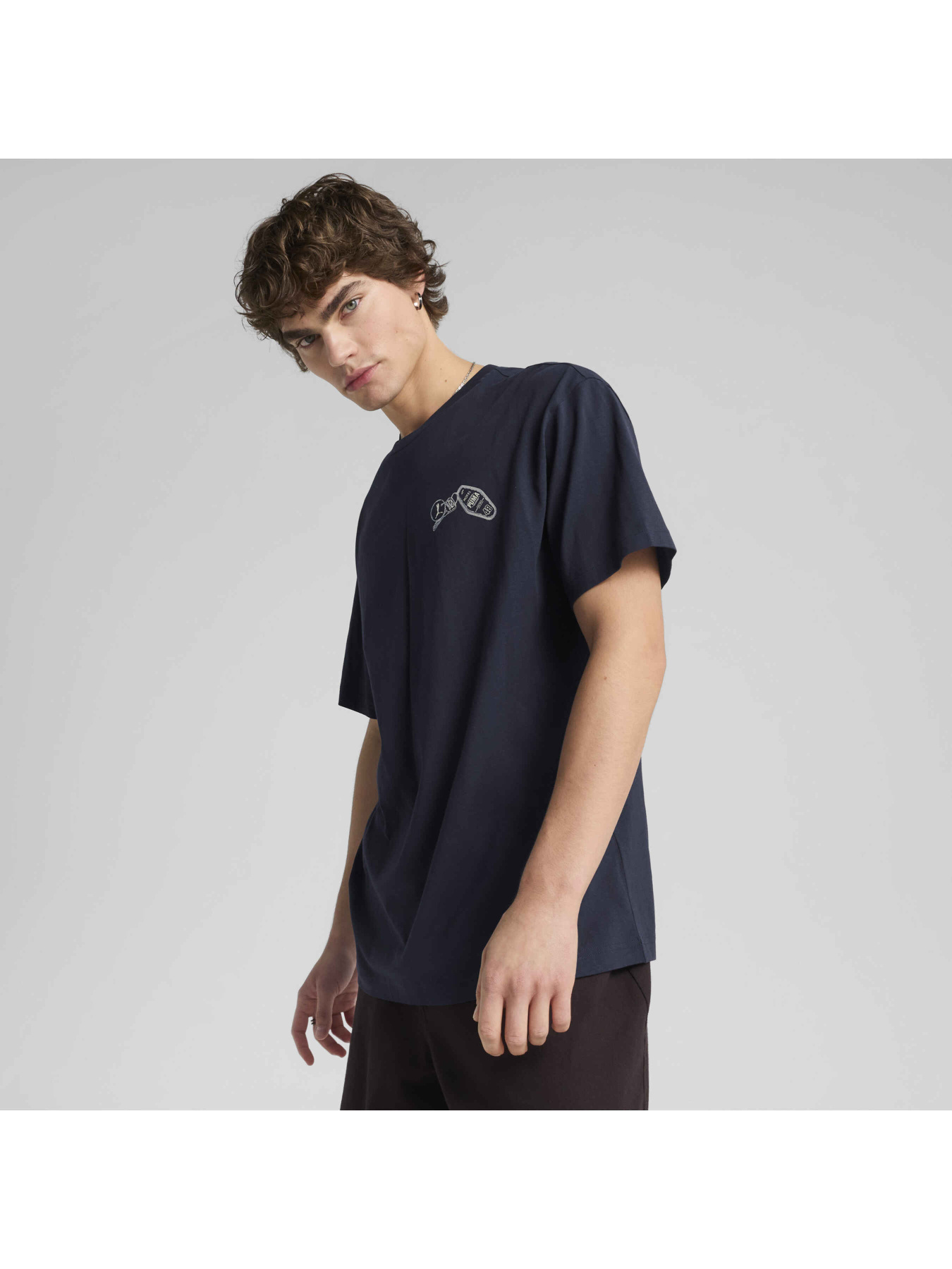 Футболка PUMA Graphics Hotel Relaxed Tee модель 629636 Футболка PUMA Graphics Hotel Relaxed Tee модель 629636 Фото