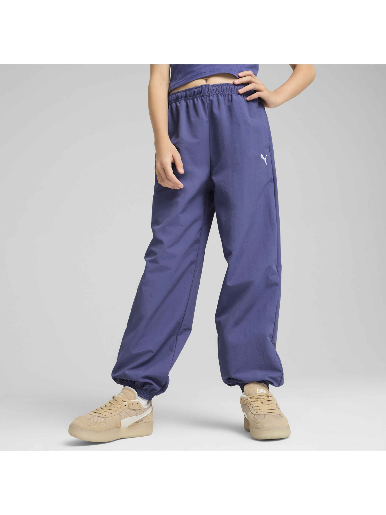 Спортивні штани PUMA Wardrobe Ess Woven Pants модель 630852 Спортивні штани PUMA Wardrobe Ess Woven Pants модель 630852 Фото
