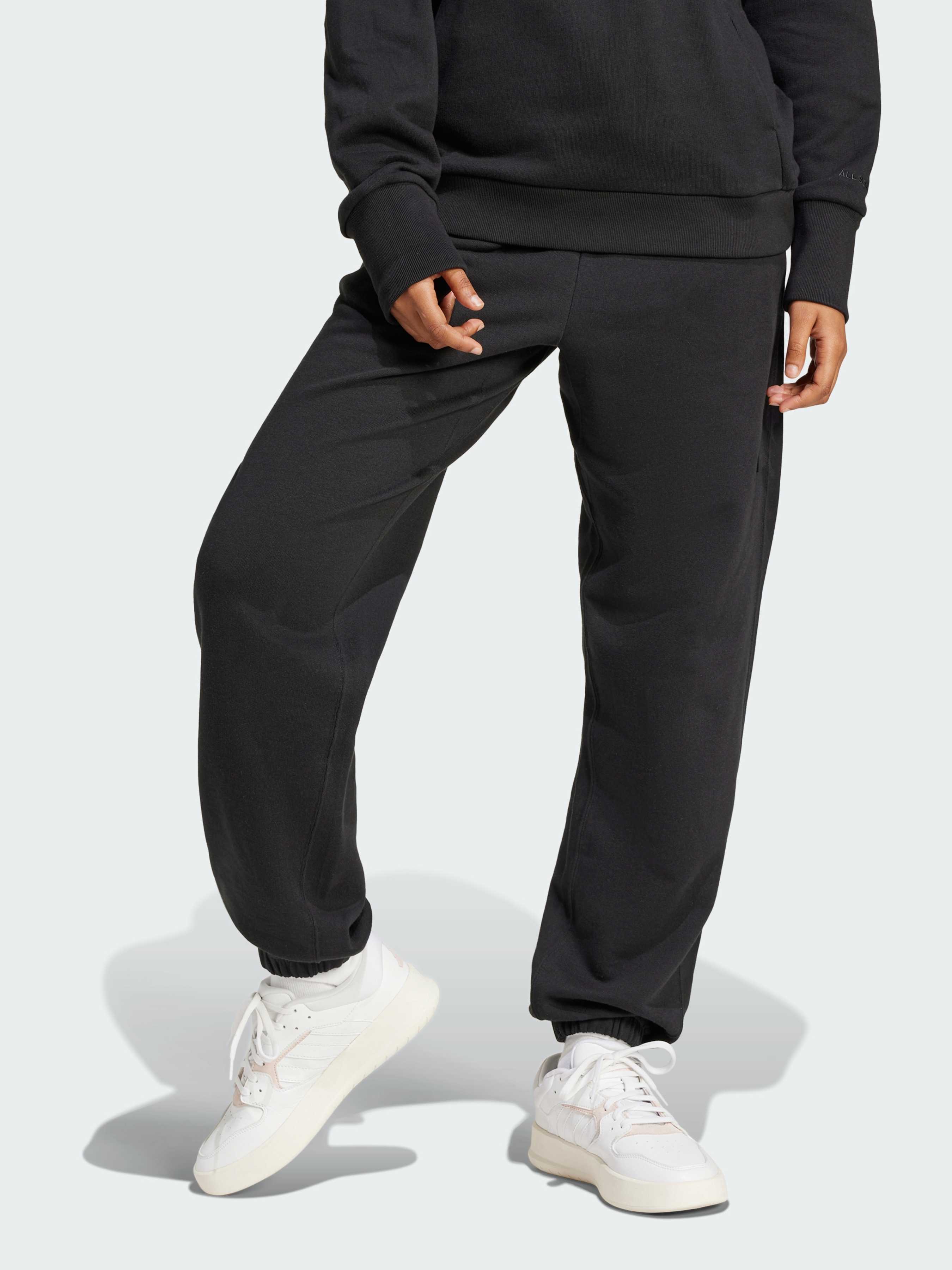 Бавовняні Жіночі Джогери adidas  (IX3810) колір чорний
