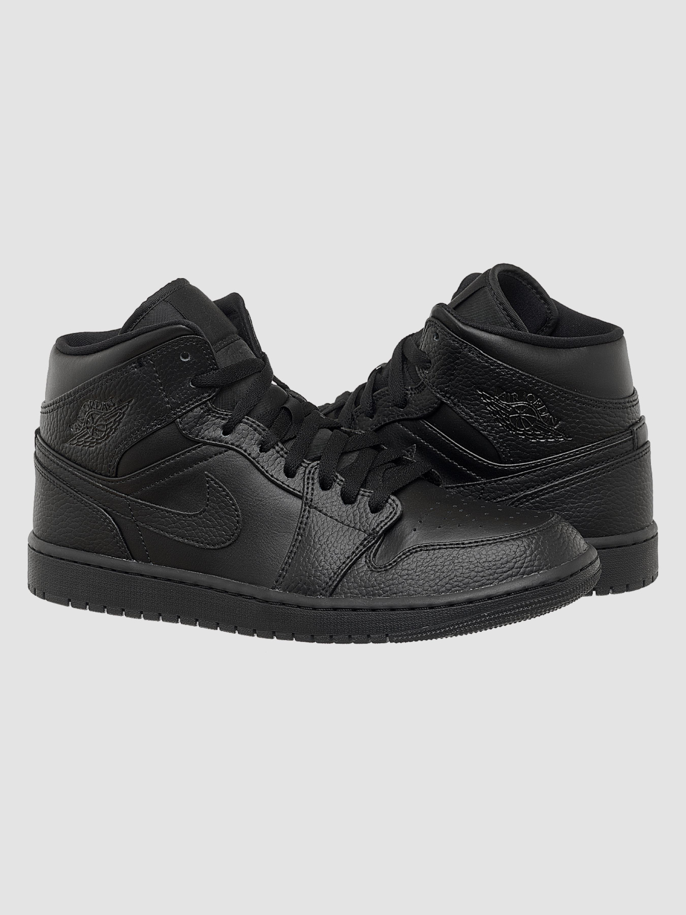 Кросівки повсякденні Jordan 1 Mid Triple Black модель 554724-091 Фото