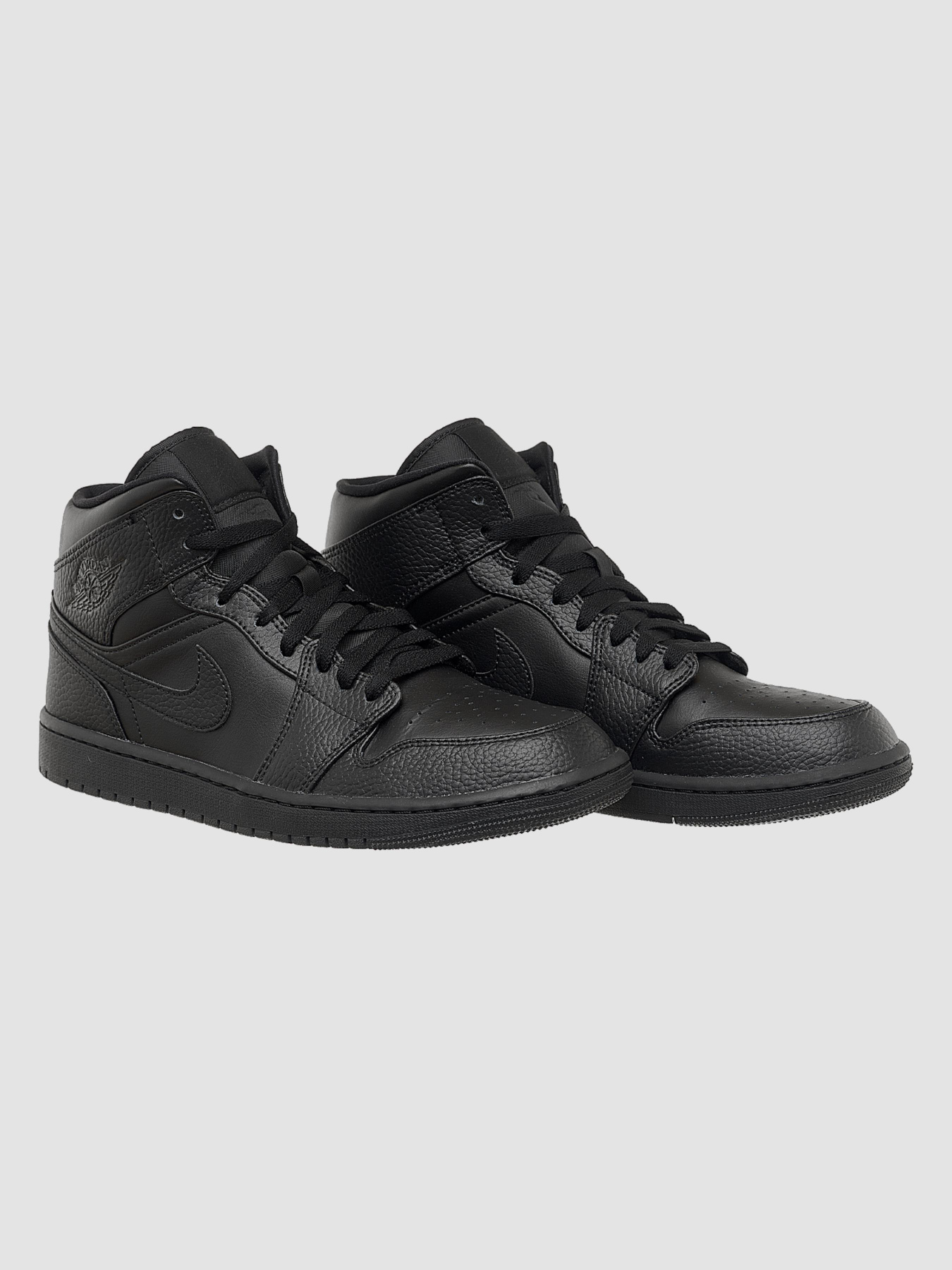 Кросівки повсякденні Jordan 1 Mid Triple Black модель 554724-091 Фото