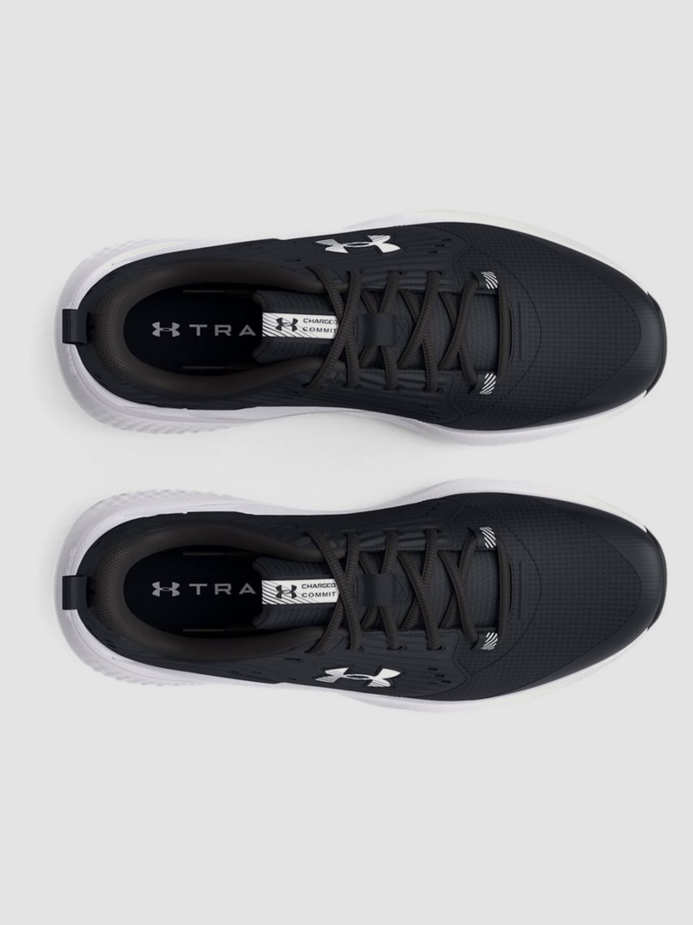 Кросівки повсякденні Under Armour Charged Commit модель 3026017-004 Кросівки повсякденні Under Armour Charged Commit модель 3026017-004 Фото