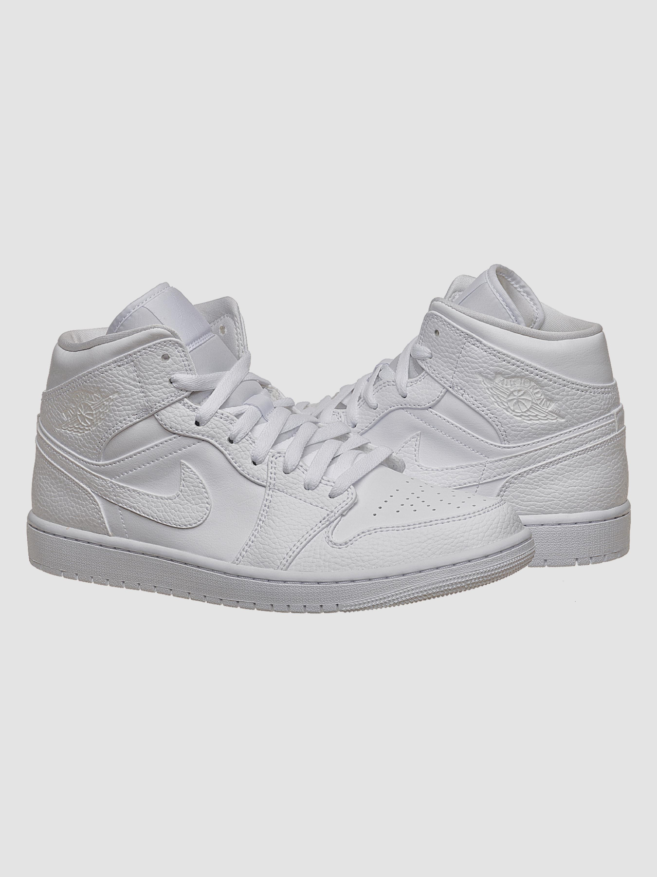 Кросівки повсякденні Jordan 1 Mid модель 554724-130 Фото