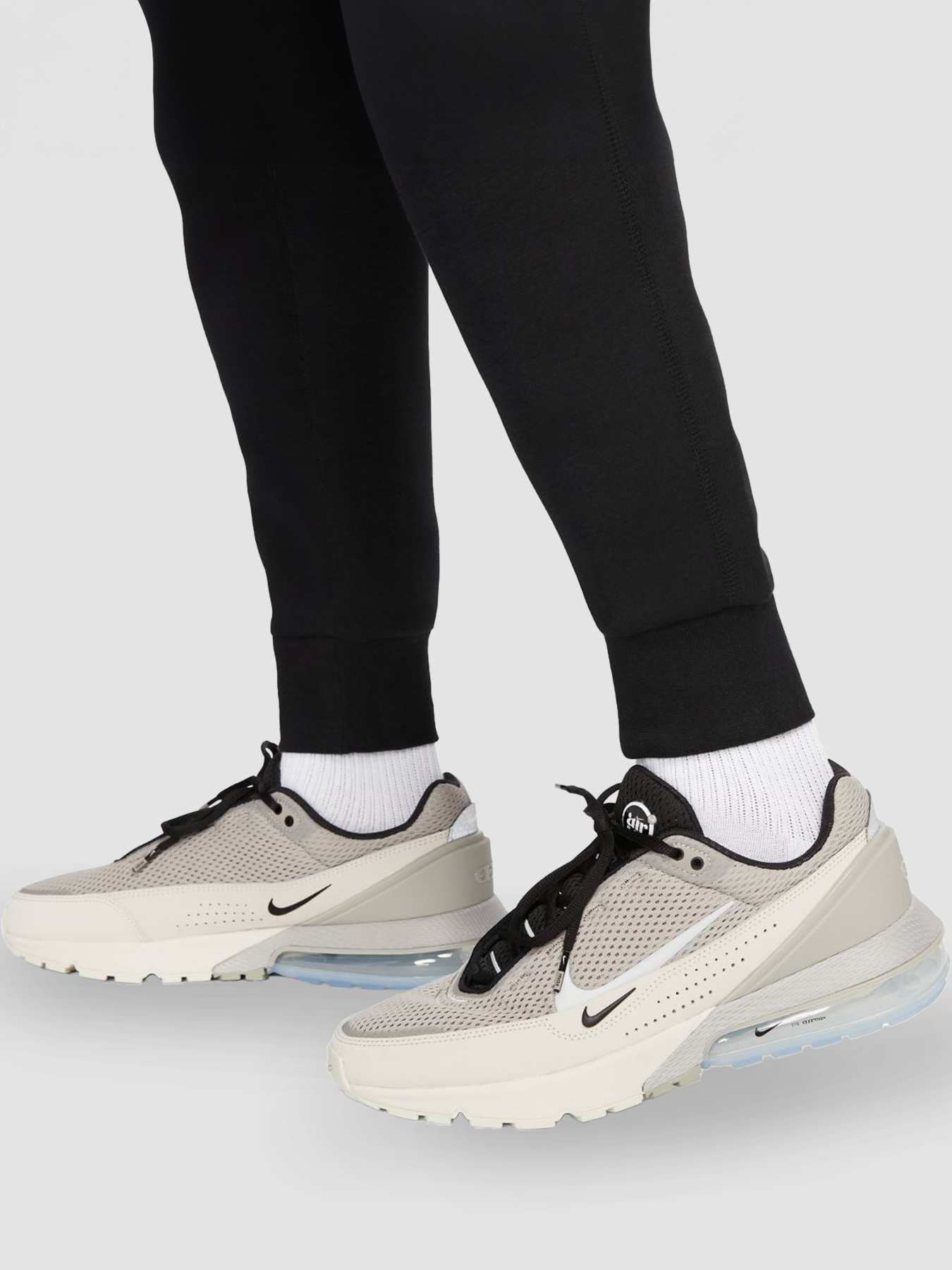 Брюки NIKE M Nk Tch Flc Jggr модель FB8002-010 Фото