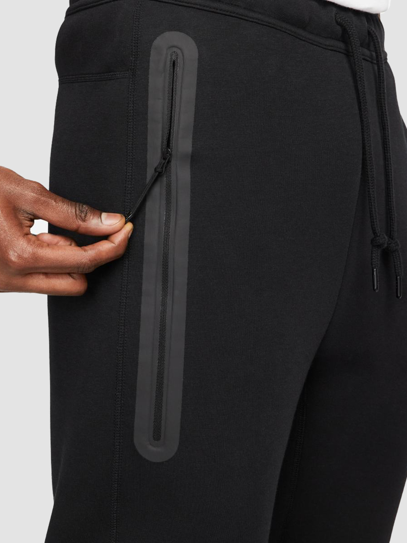 Джоггеры NIKE M Nk Tch Flc Jggr модель FB8002-010 Джоггеры NIKE M Nk Tch Flc Jggr модель FB8002-010 Фото