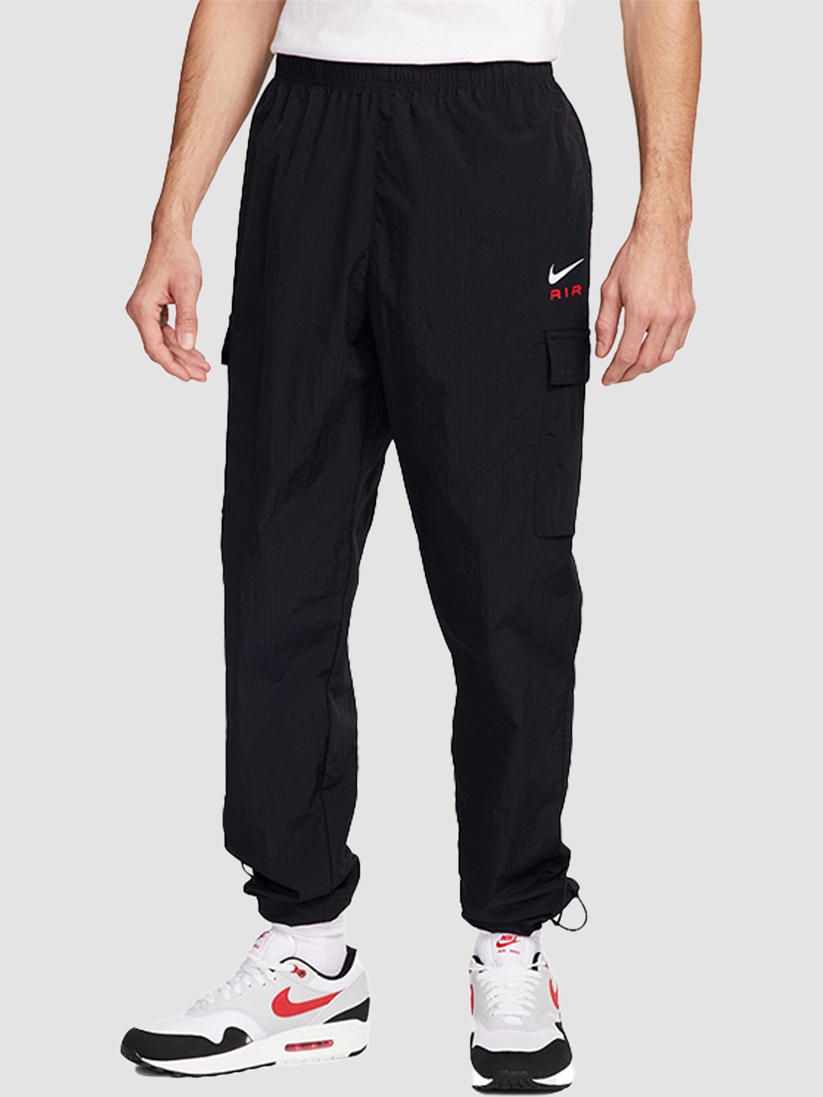 Чоловіче Карго NIKE Sportswear Sw Air Track (FZ8371-010) колір чорний, матеріал поліестер NIKE - купити в Україні
