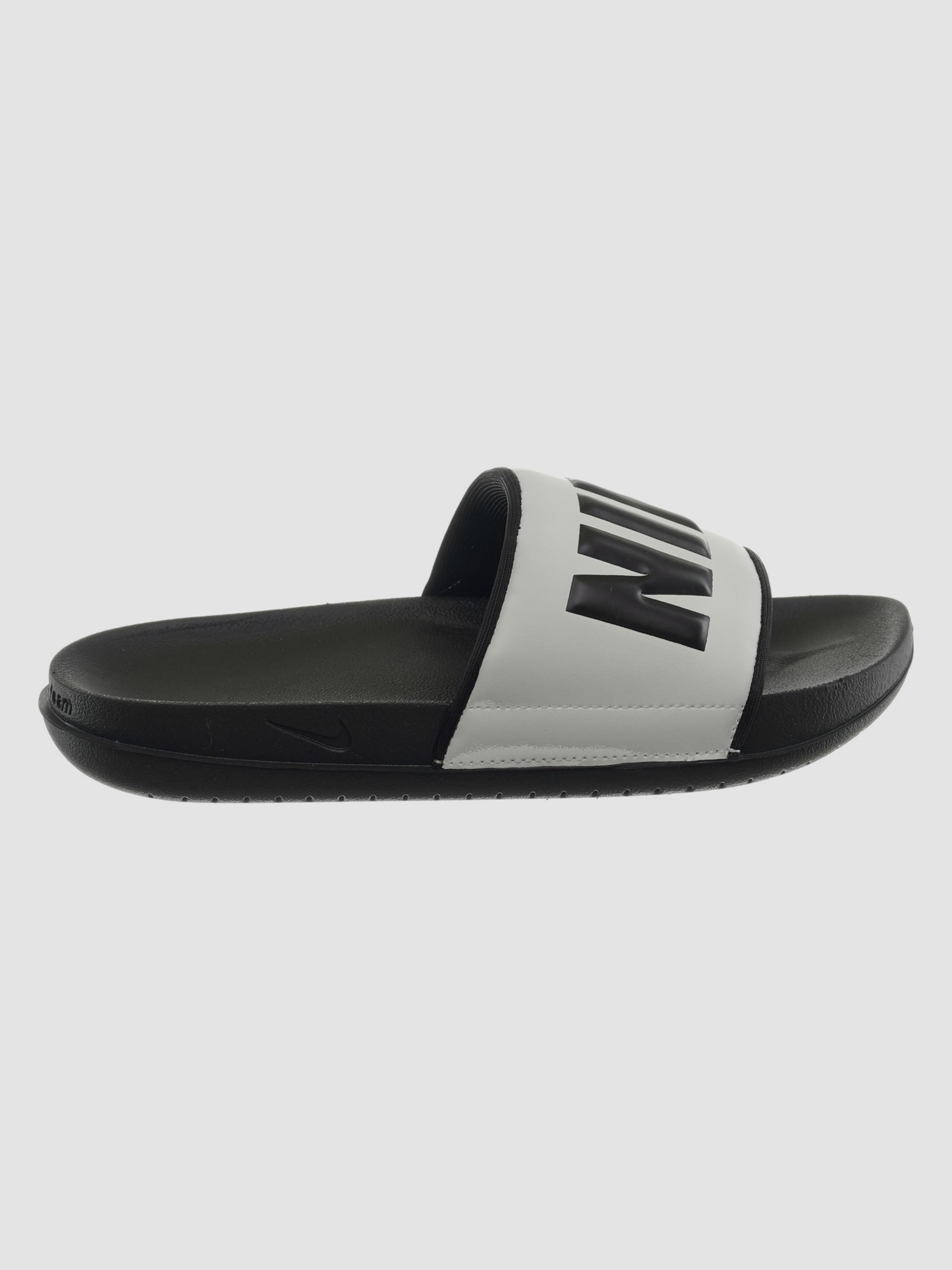 Жіночі Шльопанці NIKE Offcourt Slides (BQ4632-011) колір білий/чорний, матеріал шкіра/штучна шкіра NIKE - купити в Україні