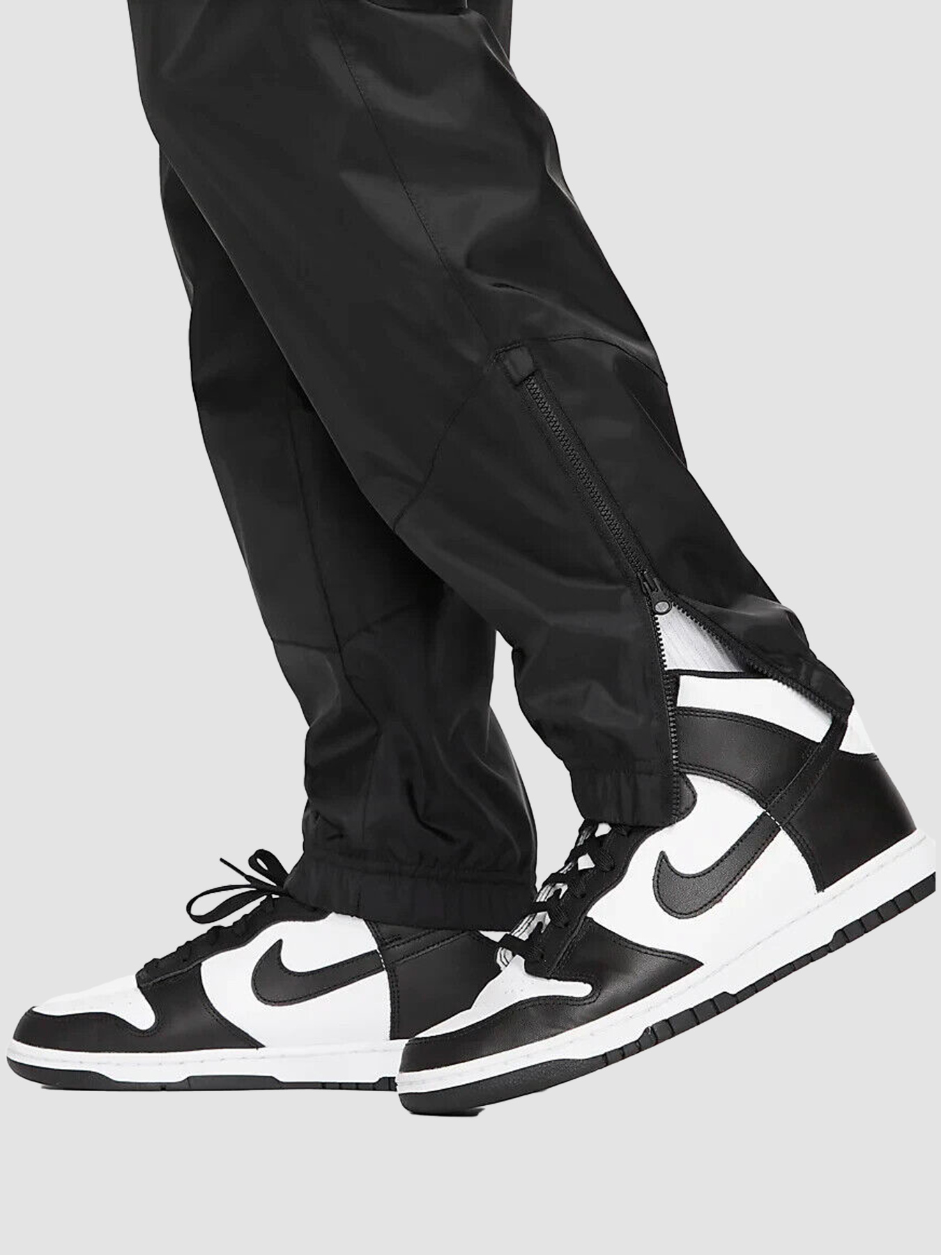 Повседневные штаны NIKE Windrunner модель DX0653-011 Фото