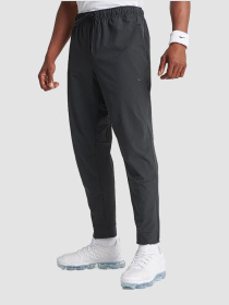 Штани повсякденні NIKE Dri-Fit Unlimited Tapered Leg модель FB7548-010 Фото