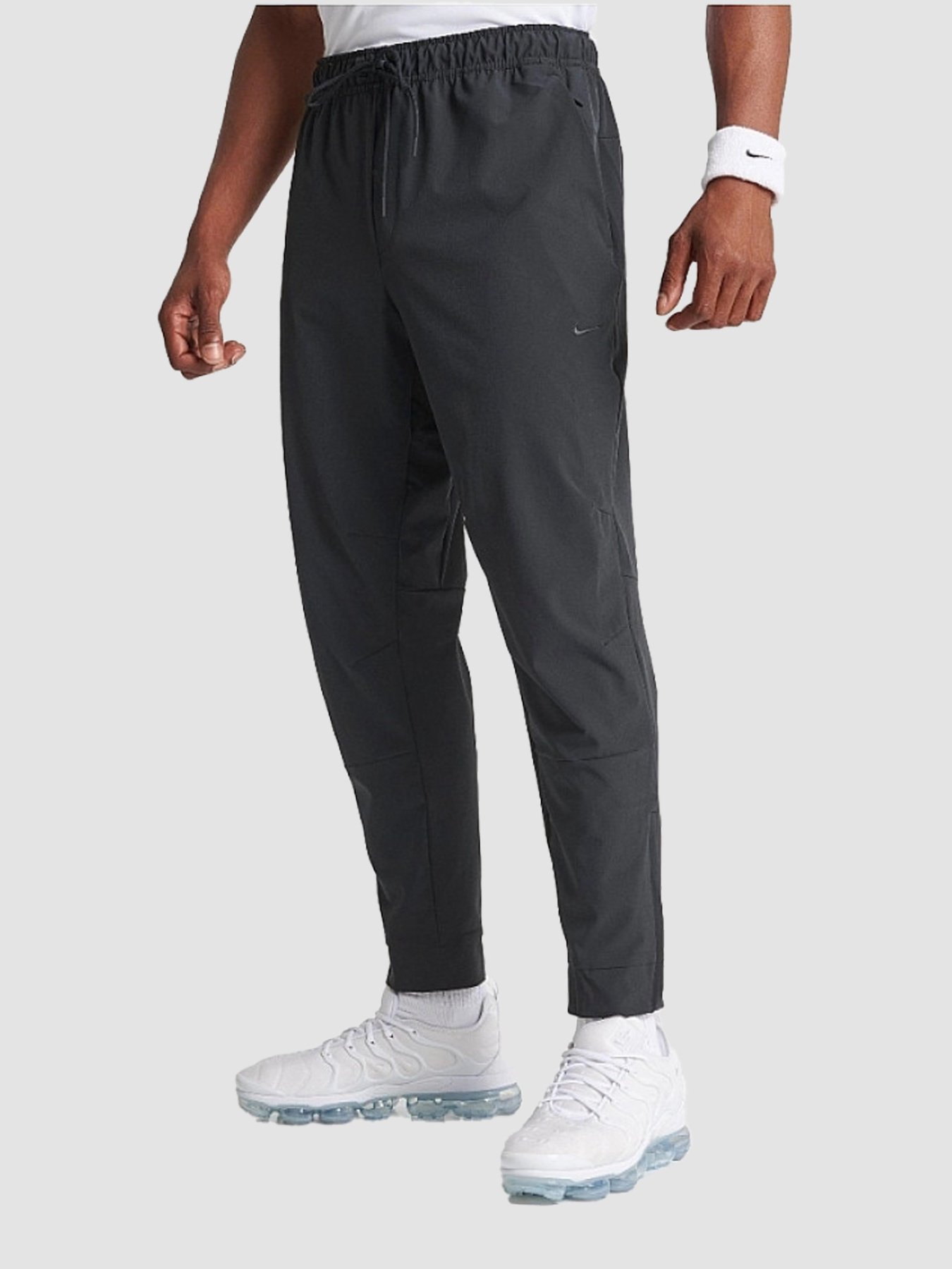 Повседневные штаны NIKE Dri-Fit Unlimited Tapered Leg модель FB7548-010 Фото
