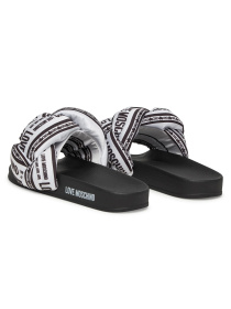 Шльопанці Moschino модель JA28312G0MIW310A Шльопанці Moschino модель JA28312G0MIW310A Фото