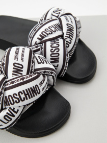 Шльопанці Moschino модель JA28312G0MIW310A Шльопанці Moschino модель JA28312G0MIW310A Фото