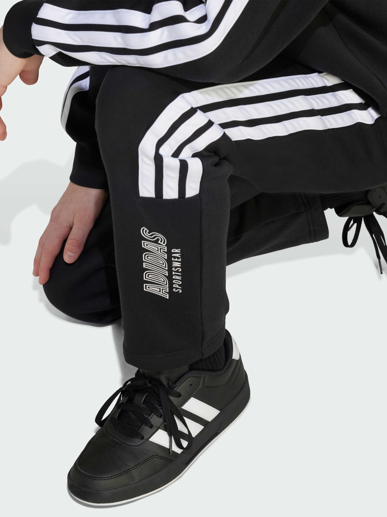 Повсякденні штани Adidas Tiro модель JM1514 Фото