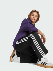 Повсякденні штани Adidas Adicolor модель KE5280 Повсякденні штани Adidas Adicolor модель KE5280 Фото