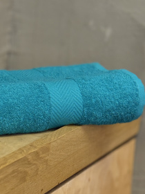 Рушник махровий з бортом бірюзового кольору Ecotton модель 25230 Рушник махровий з бортом бірюзового кольору Ecotton модель 25230 Фото