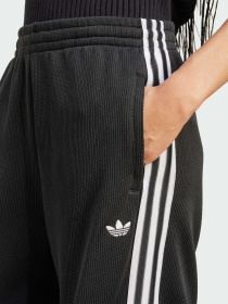 Повсякденні штани Adidas Adicolor модель JV7525 Фото