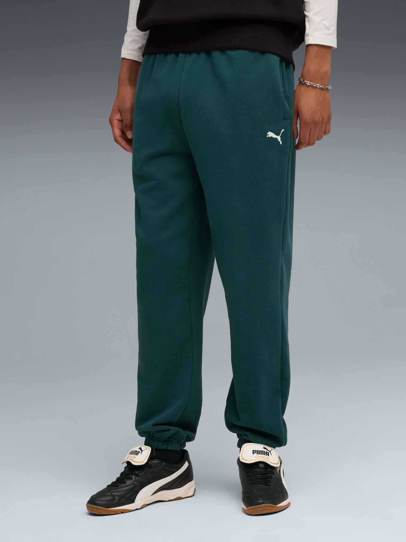 Штаны спортивные PUMA Wardrobe Ess Sweatpants модель 631535 Штаны спортивные PUMA Wardrobe Ess Sweatpants модель 631535 Фото