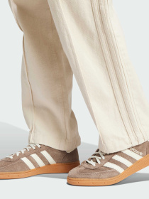 Широкі джинси Adidas модель IW5753 Фото