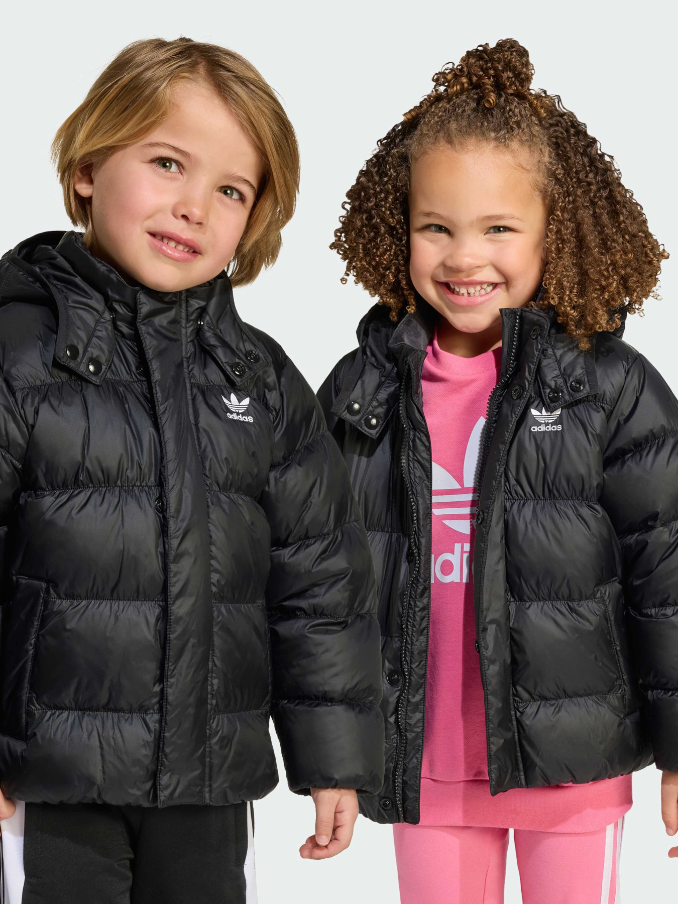 Пуховик Adidas Adicolor модель JX0550 Пуховик Adidas Adicolor модель JX0550 Фото