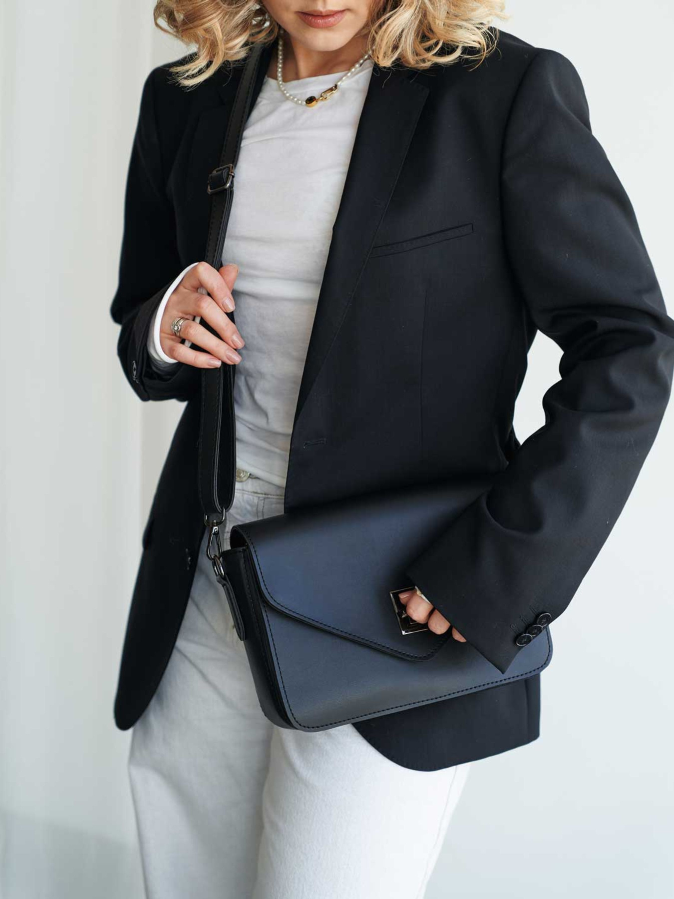 Сумка WeLassie модель stilxna-zhnocha-sumochka-regna-chornij Фото