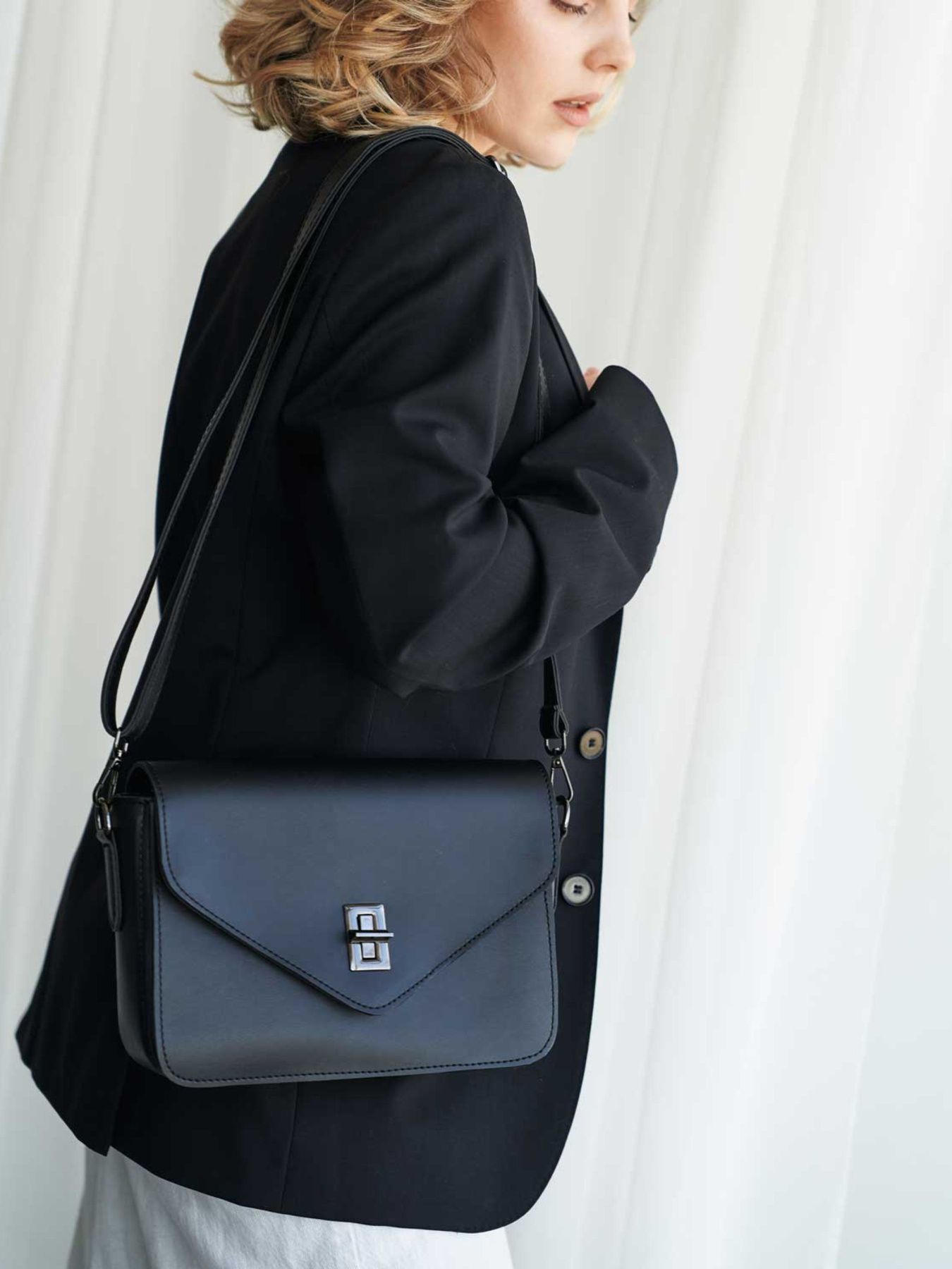 Сумка WeLassie модель stilxna-zhnocha-sumochka-regna-chornij Фото