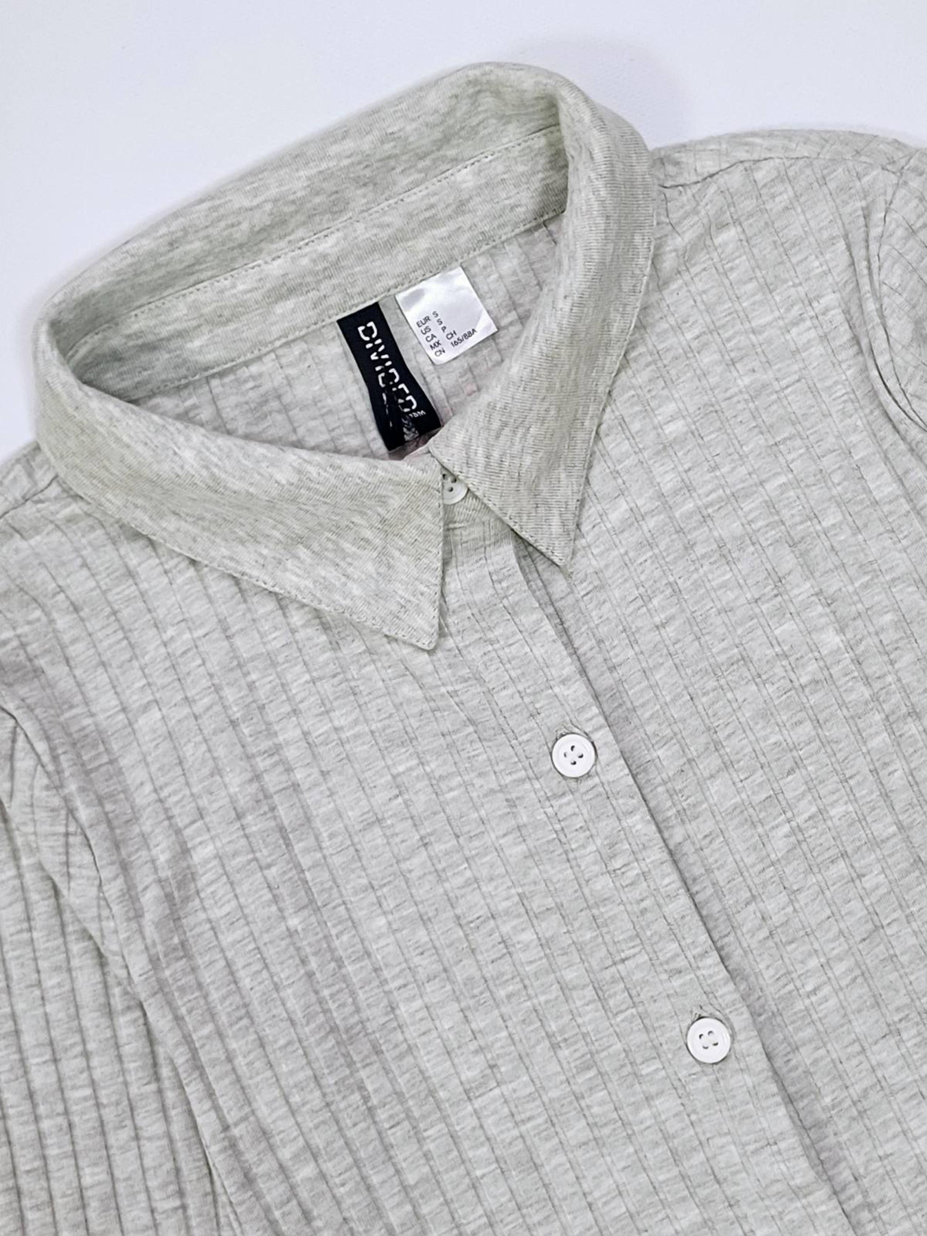 Платье мини H&M модель 9946052wer_Светло-серый Платье мини H&M модель 9946052wer_Светло-серый Фото