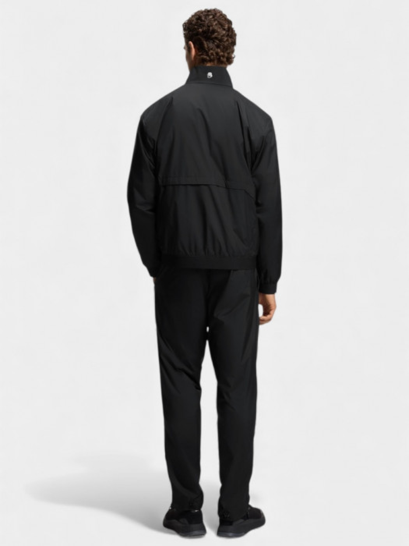 Чорний спортивний костюм LW_Match Tracksuit з водовідштовхувальним покриттям модель 11338 Чорний спортивний костюм LW_Match Tracksuit з водовідштовхувальним покриттям модель 11338 Фото