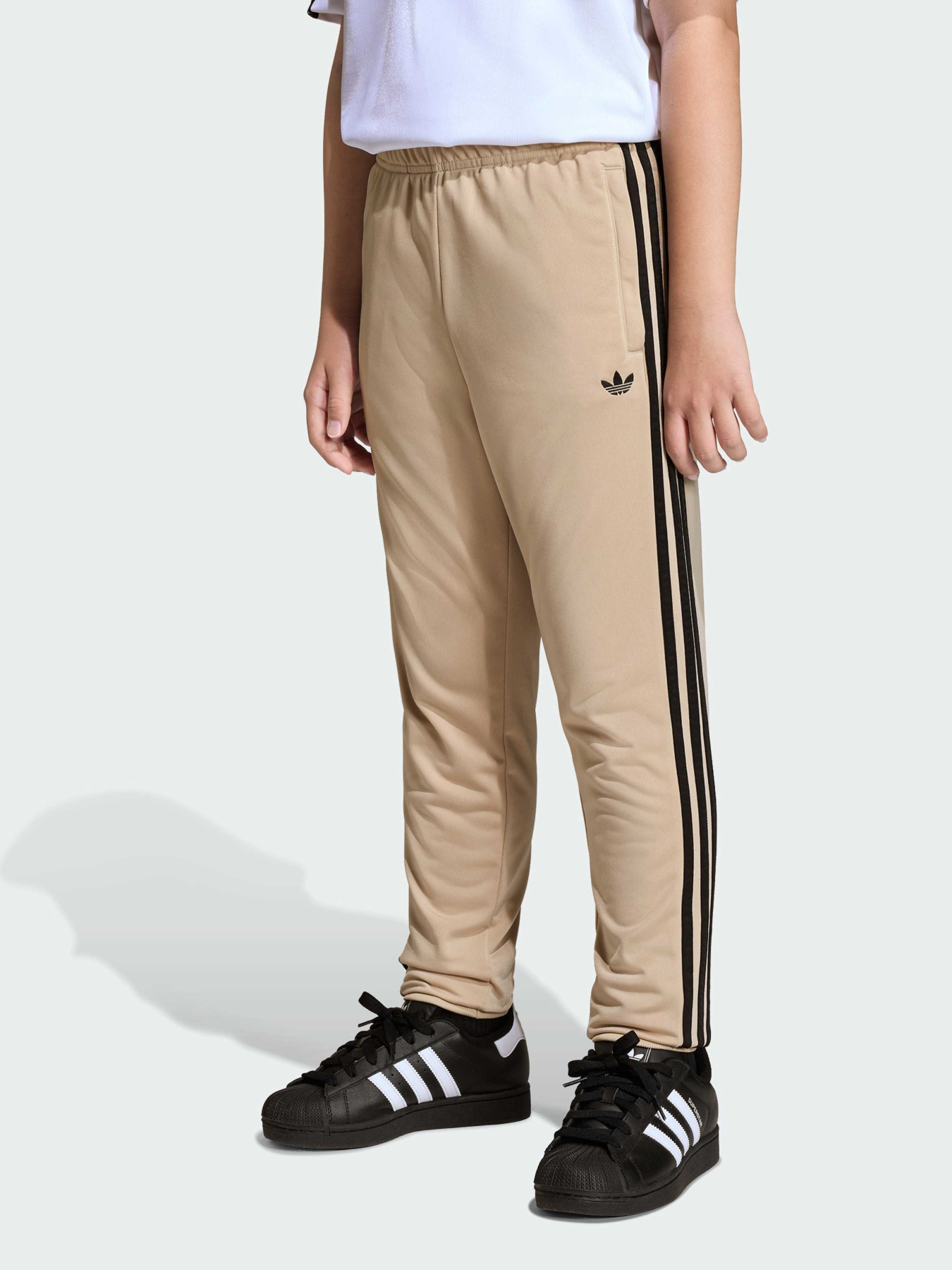 Повседневные штаны Adidas Adicolor модель KE2864 Повседневные штаны Adidas Adicolor модель KE2864 Фото