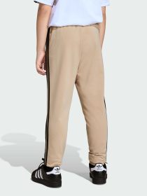 Повседневные штаны Adidas Adicolor модель KE2864 Повседневные штаны Adidas Adicolor модель KE2864 Фото