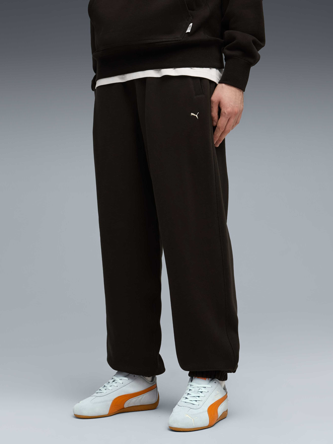 Спортивні штани PUMA Mmq Sweatpants модель 632296 Фото