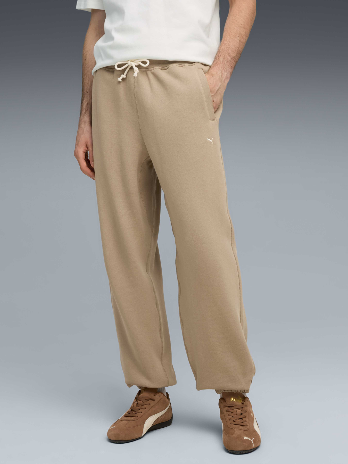 Спортивні штани PUMA Mmq Sweatpants модель 632296 Фото