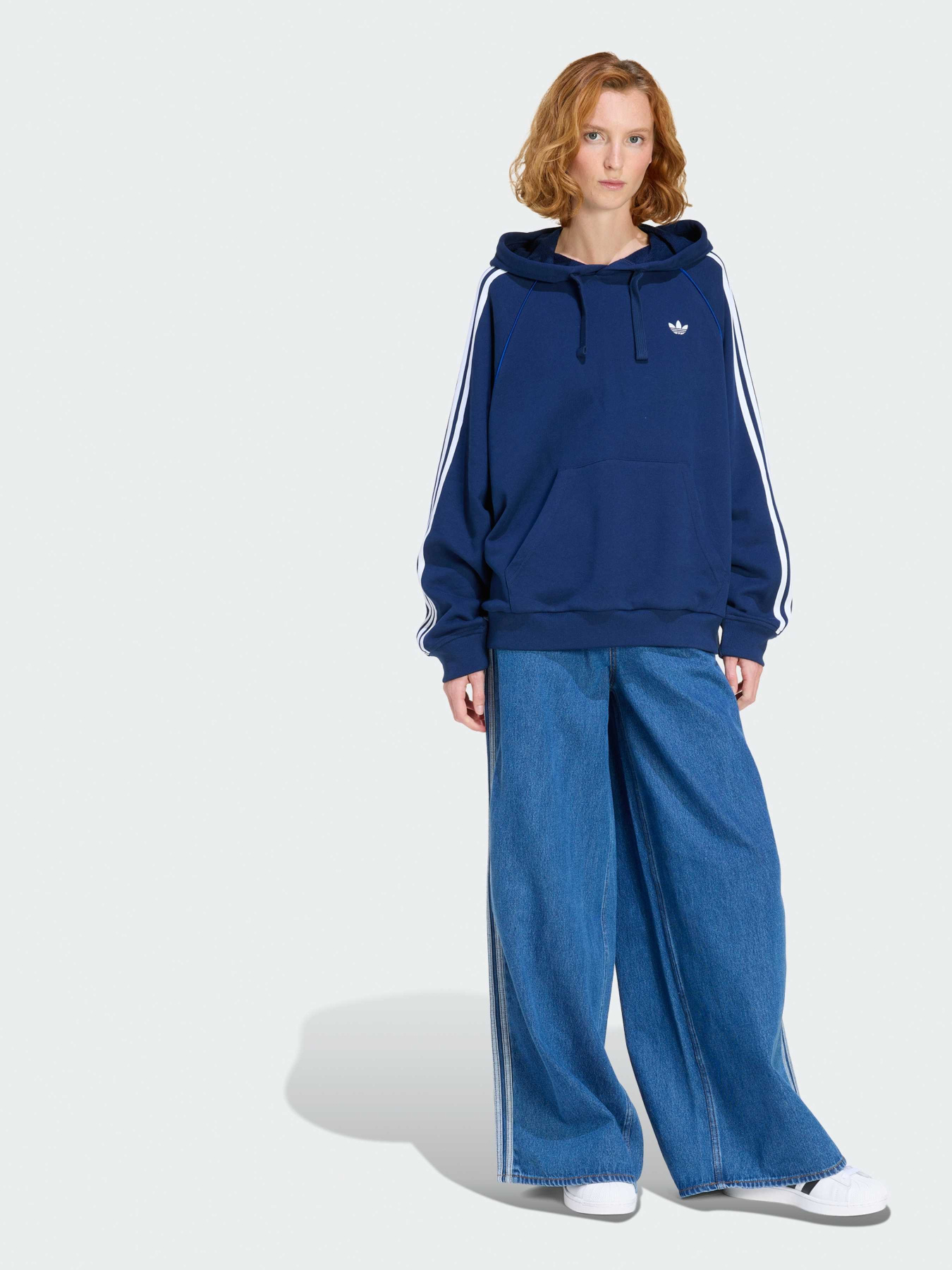 Широкі джинси Adidas Adicolor модель KD2906 Широкі джинси Adidas Adicolor модель KD2906 Фото