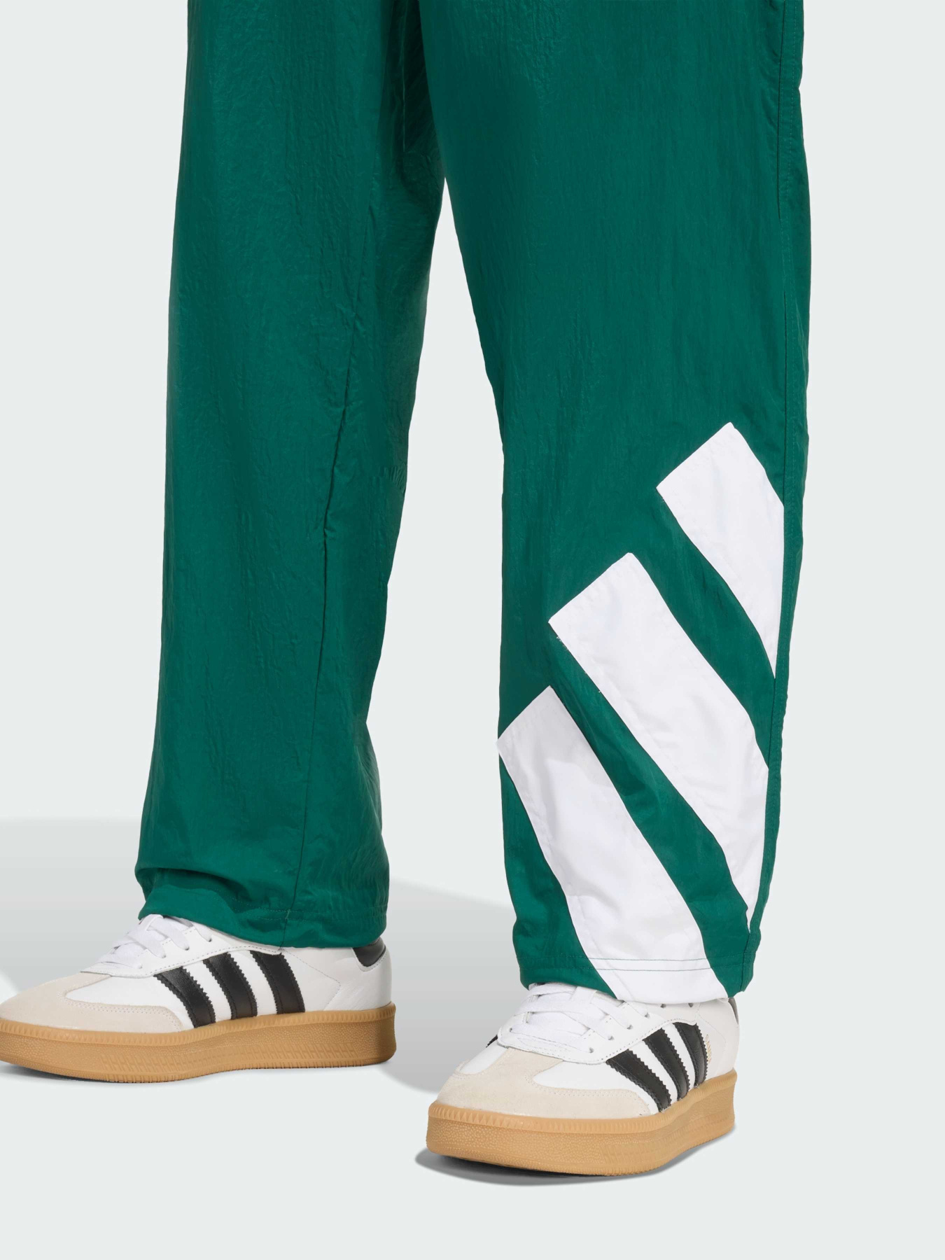 Повсякденні штани Adidas Adicolor модель KE0870 Фото