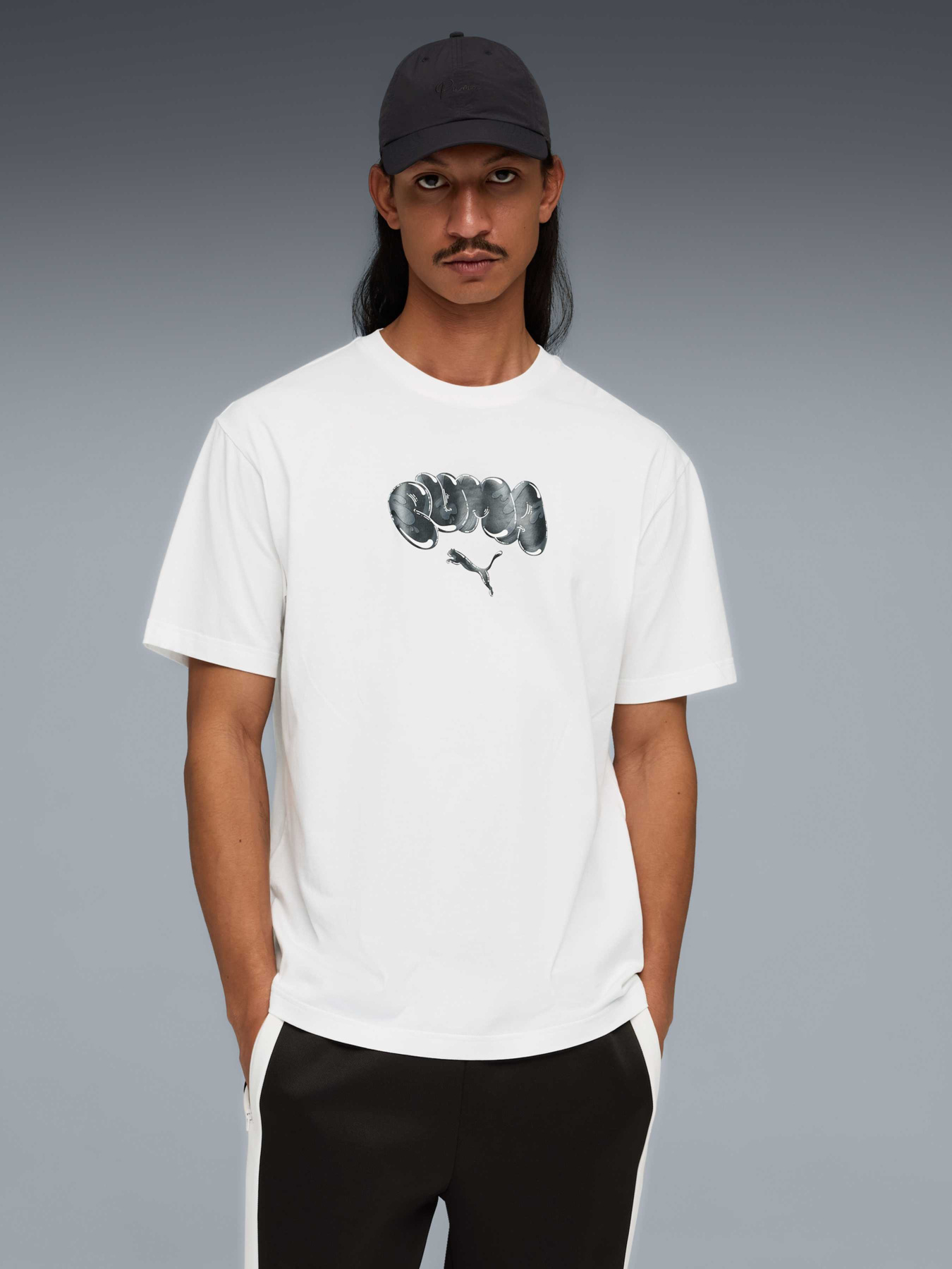 Футболка PUMA Graphic Tee модель 634439 Футболка PUMA Graphic Tee модель 634439 Фото