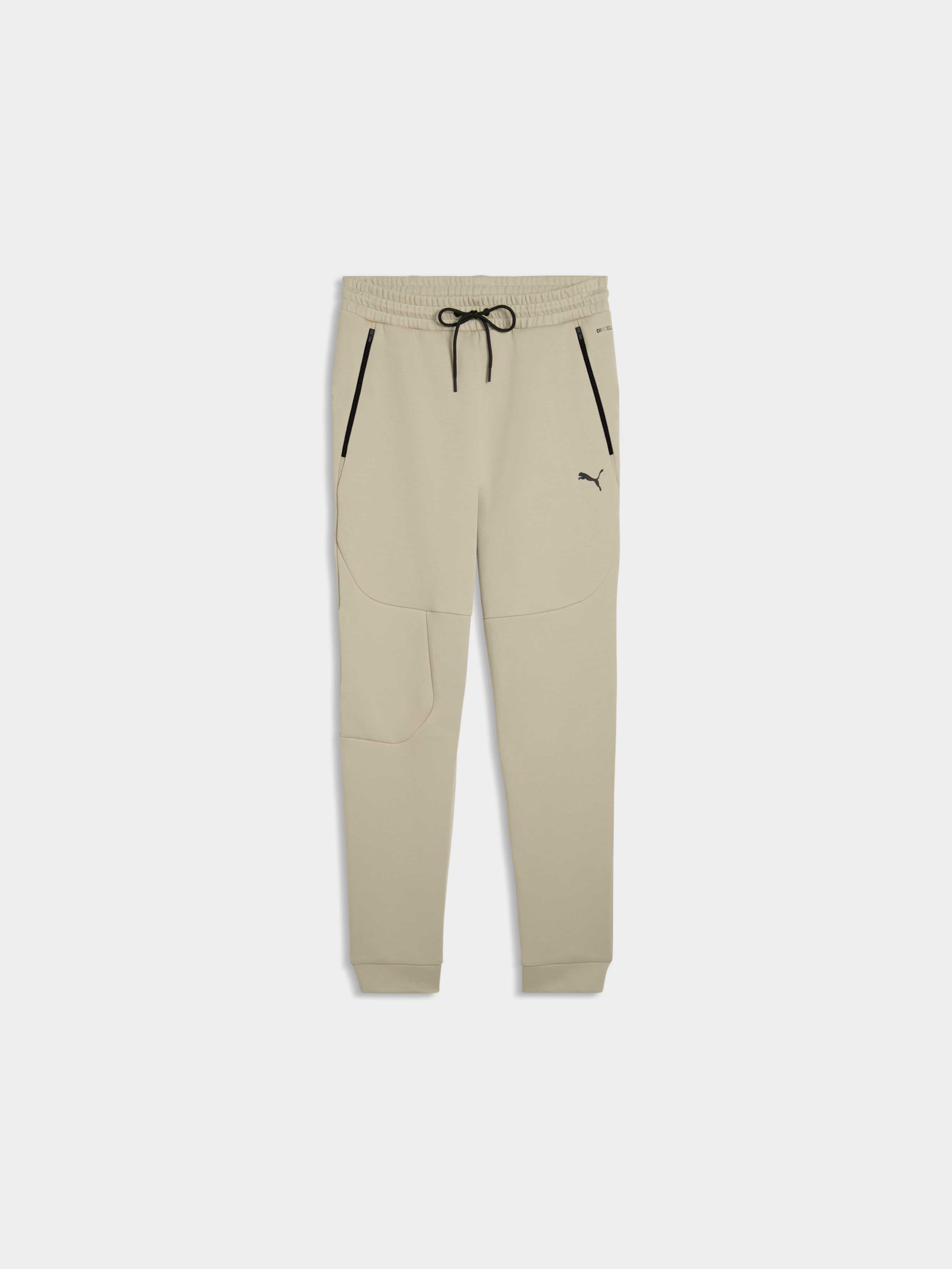 Чоловічі Спортивні штани PUMA Tech Sweatpants Dk Cl (634416_61) колір бежевий, матеріал комбінований верх PUMA - купити в Україні