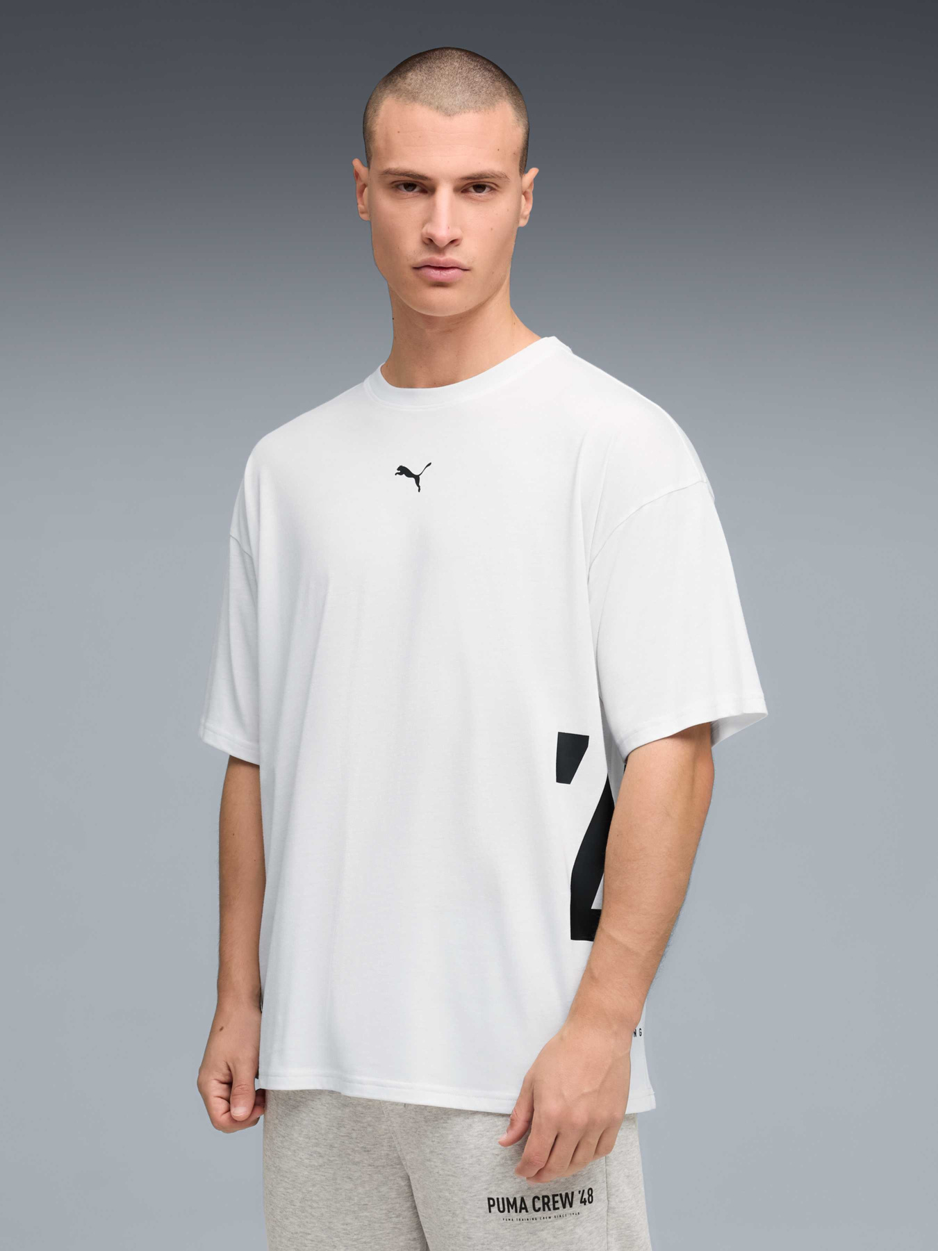 Спортивна футболка PUMA M Graphic Oversized Tee модель 528528 Фото