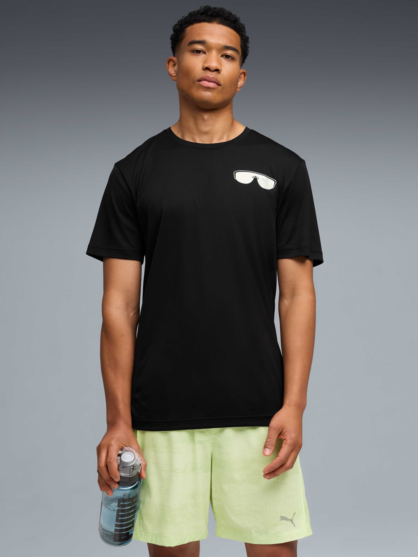 Футболка спортивная PUMA M Run Nitro Graphic Tee модель 528449 Футболка спортивная PUMA M Run Nitro Graphic Tee модель 528449 Фото