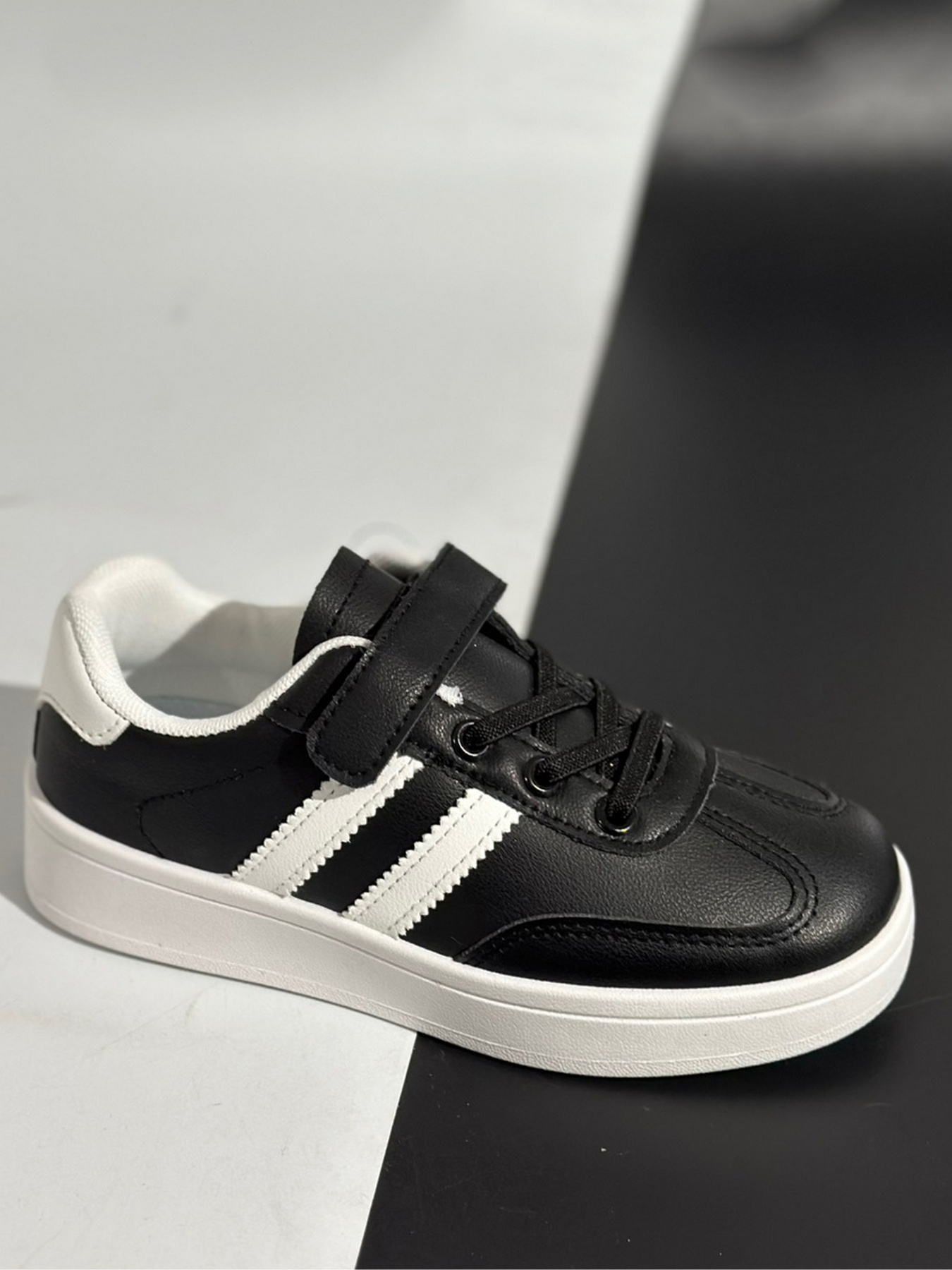 Кожаные кроссовки Stilli XTN320-2 Черный модель XTN320-2 Фото