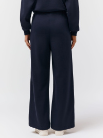 Спортивні штани широкі жіночі XOLTRA темно-сині модель 10048866 Спортивні штани широкі жіночі XOLTRA темно-сині модель 10048866 Фото