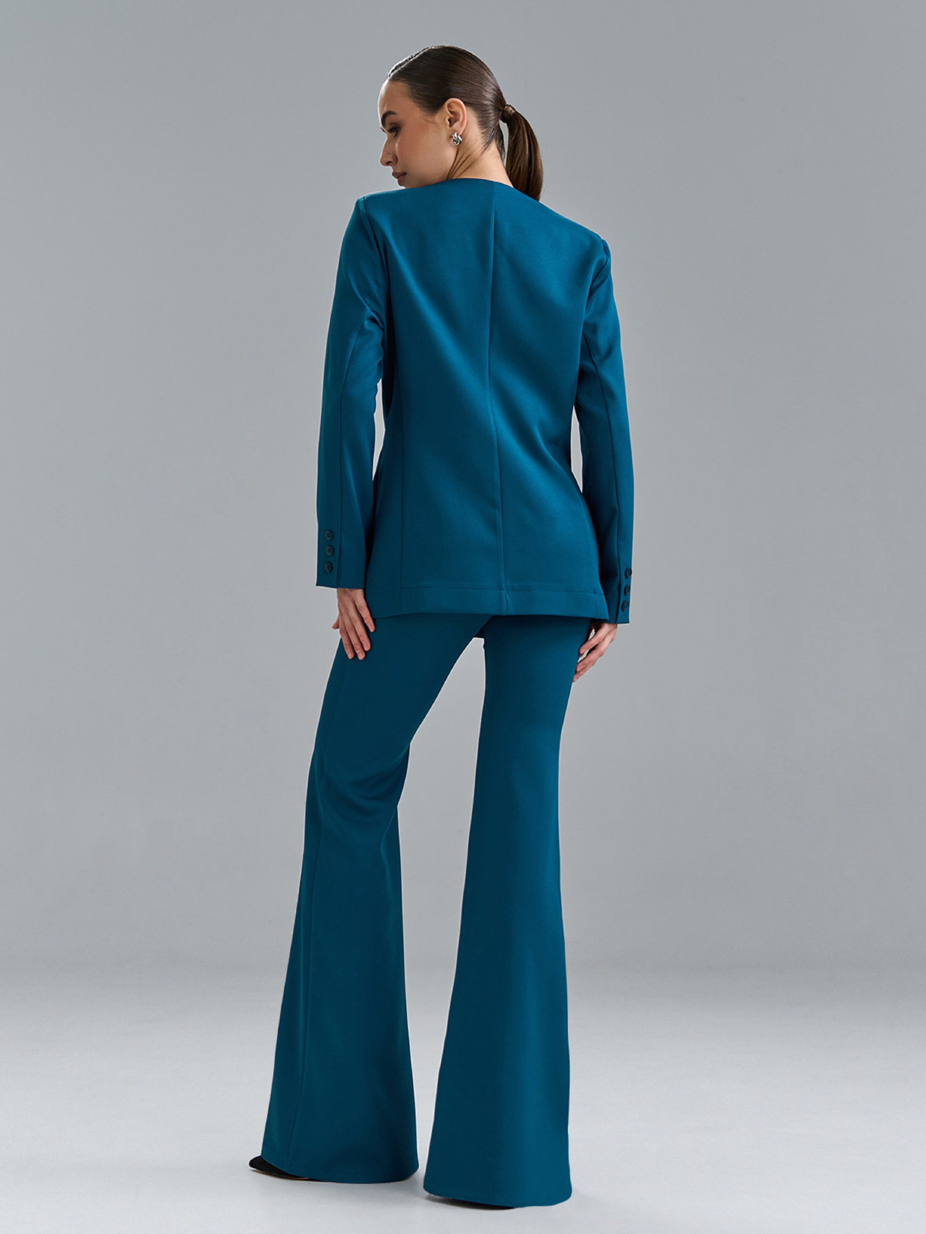 Жіночі костюми модель 15527_бирюзовый Жіночі костюми модель 15527_бирюзовый Фото