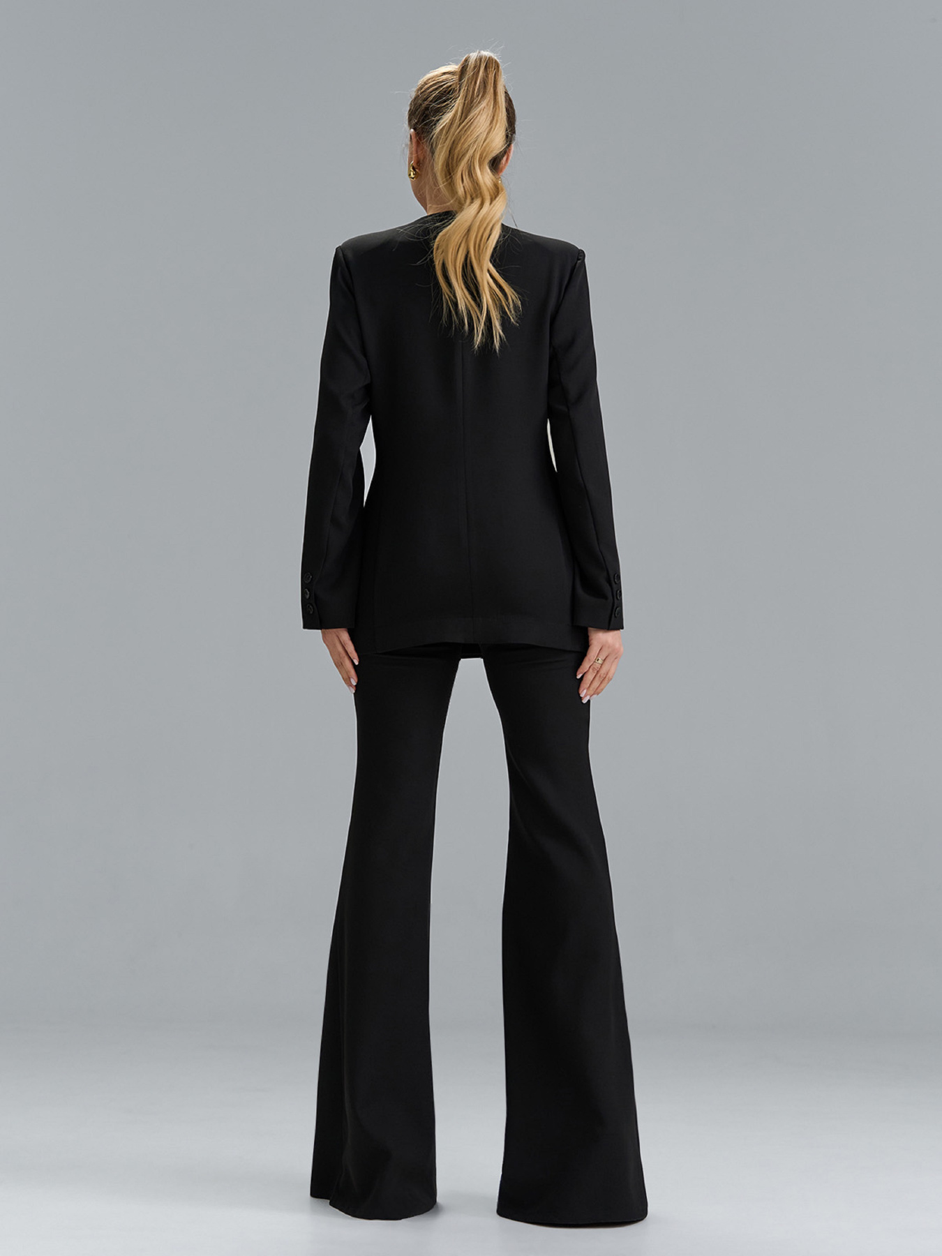 Жіночі костюми модель 15527_черный Жіночі костюми модель 15527_черный Фото